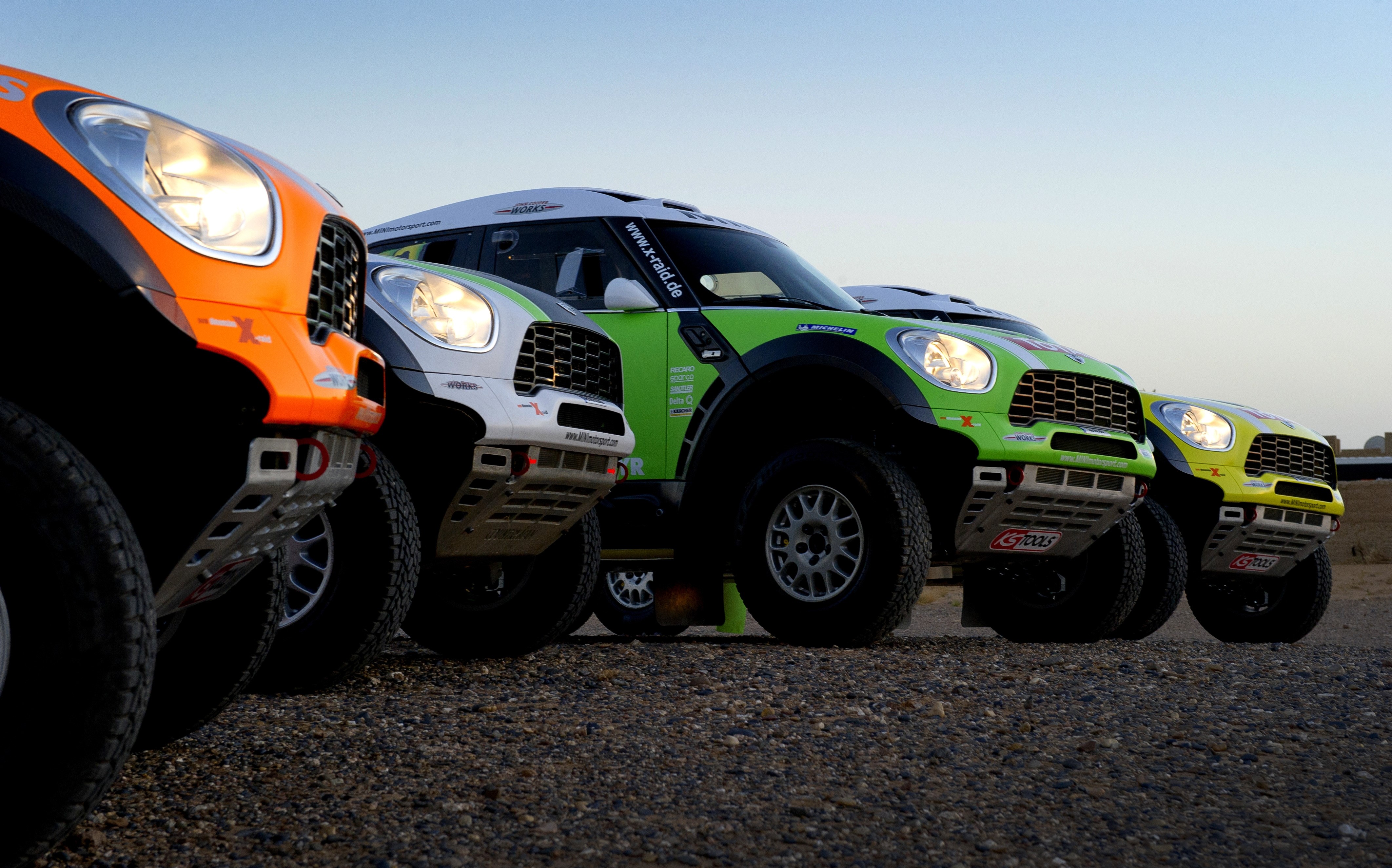 Four Mini Cooper Rally Cars Lined Up HD Wallpaper