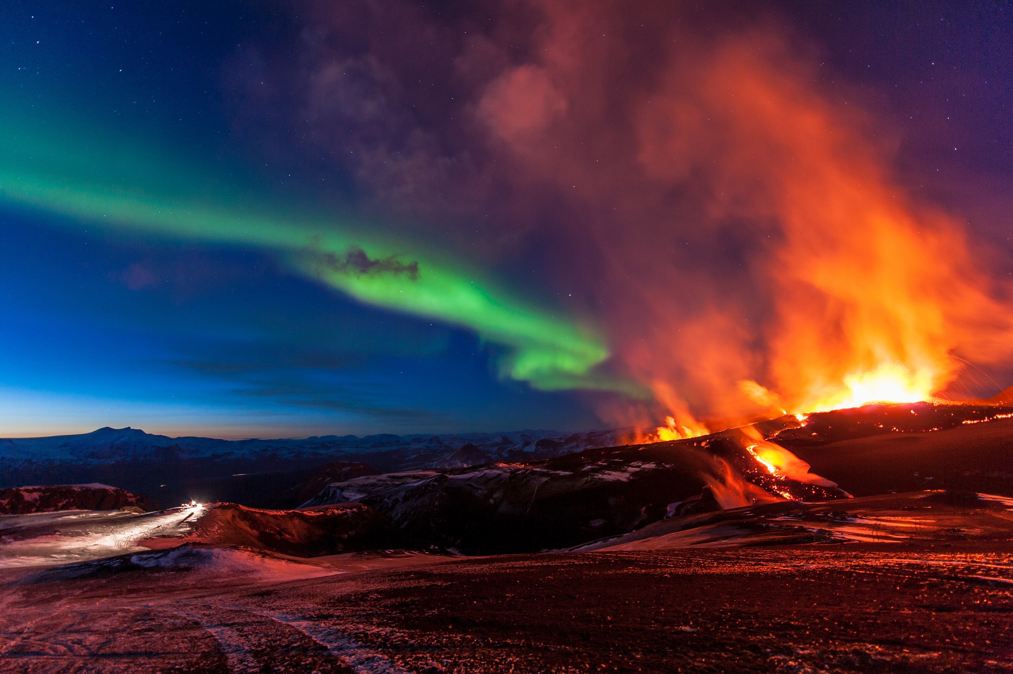 Aurora Borealis over Volcano Eruption HD Wallpaper