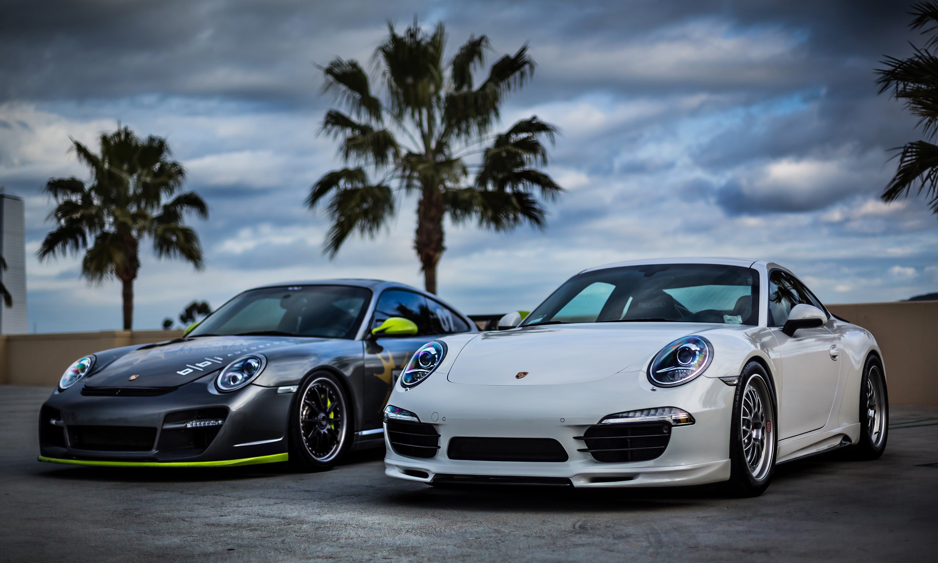 Two Porsche 911 cars, one white and one gray HD Wallpaper
