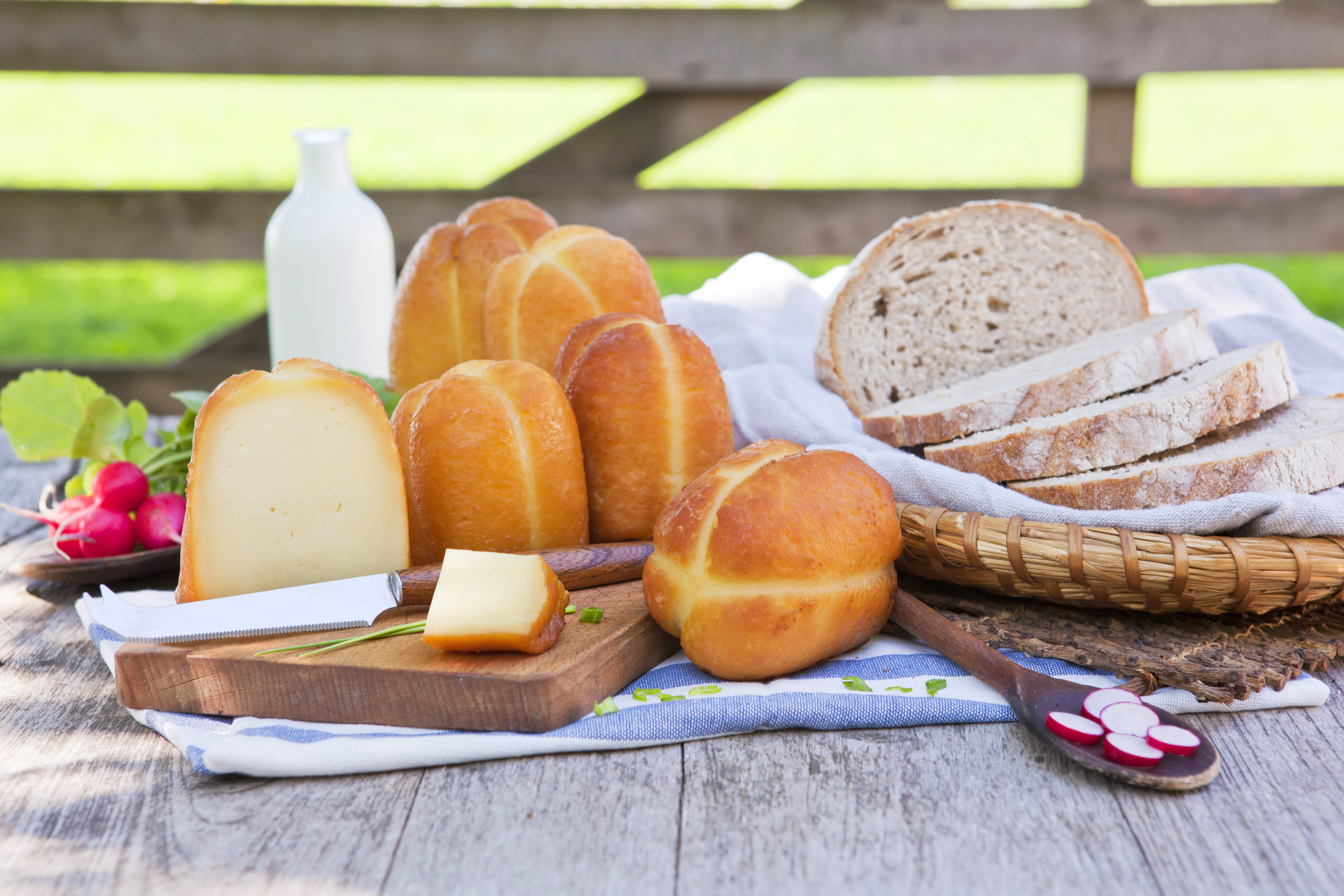 Bread, Buns, Cheese, and Milk on a Table HD Wallpaper
