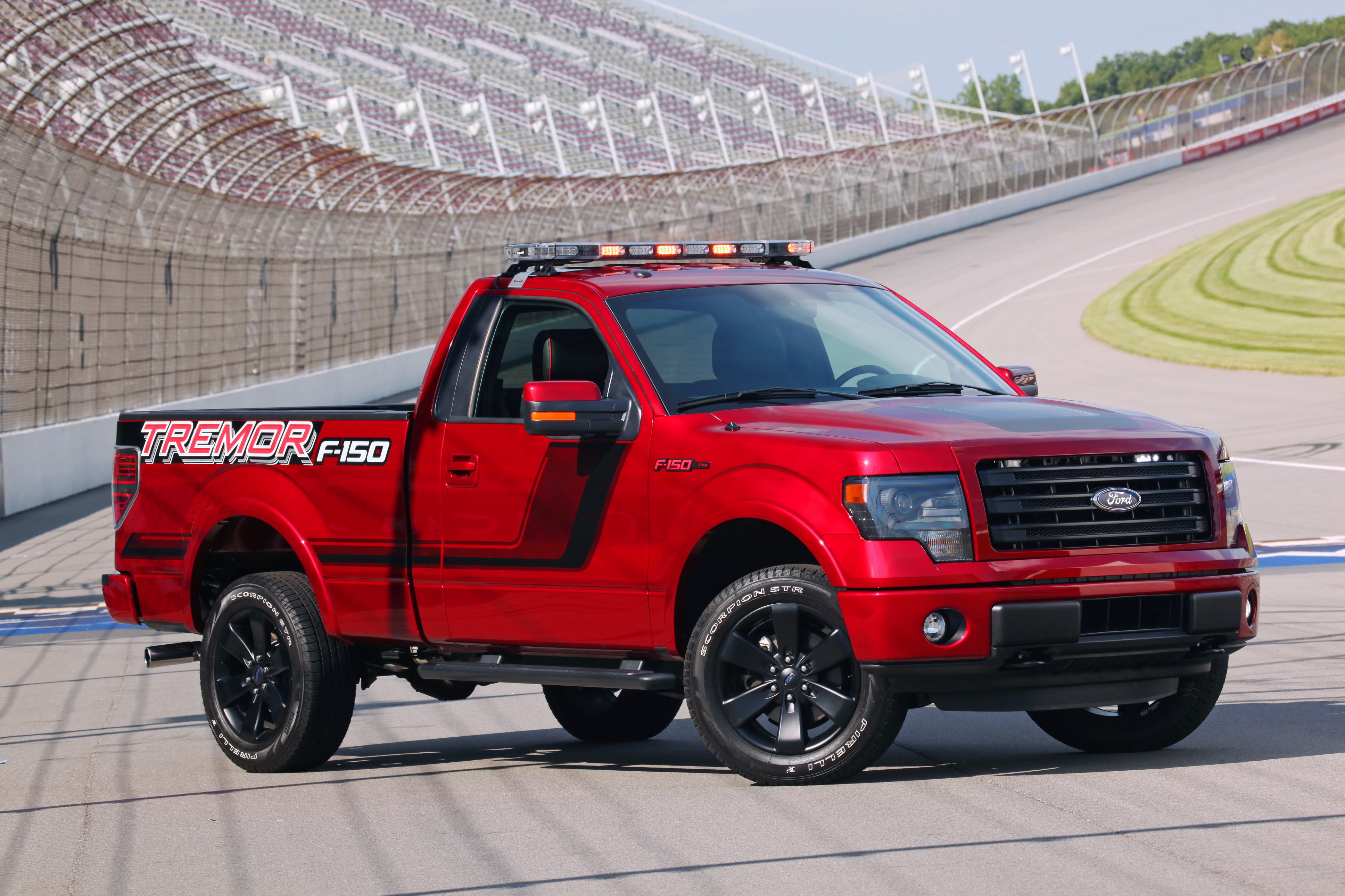 Red 2014 Ford F-150 Tremor on Race Track HD Wallpaper
