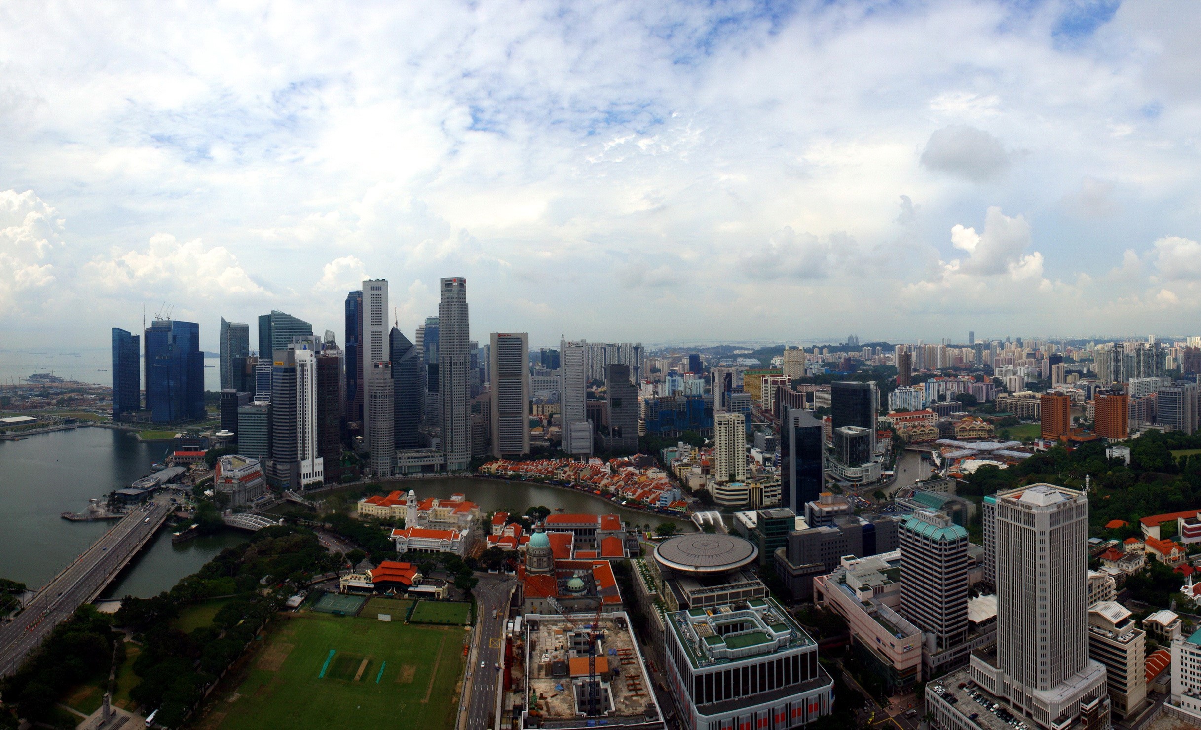 Singapore skyline with skyscrapers and clouds HD Wallpaper