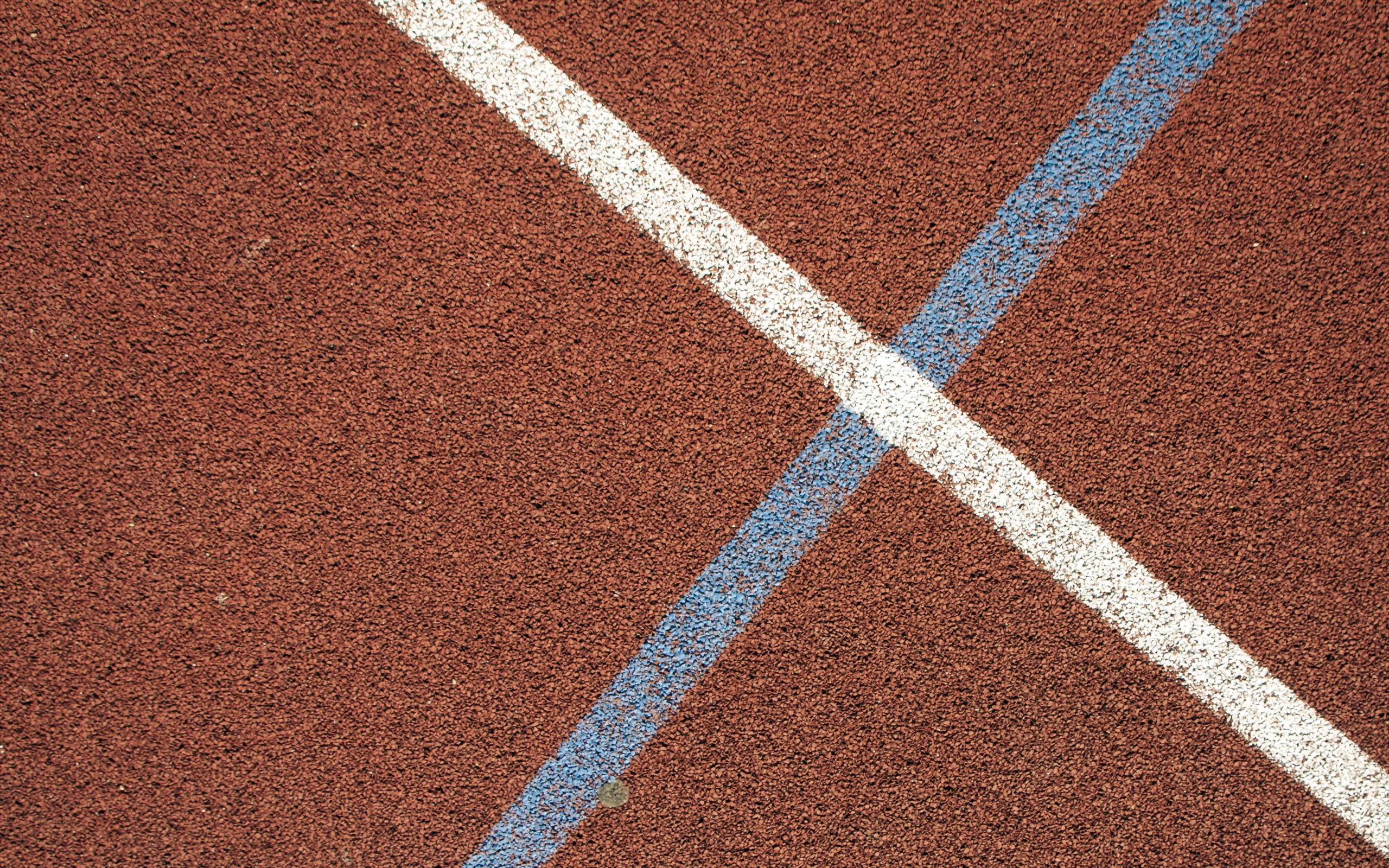Running track texture with white and blue lines HD Wallpaper