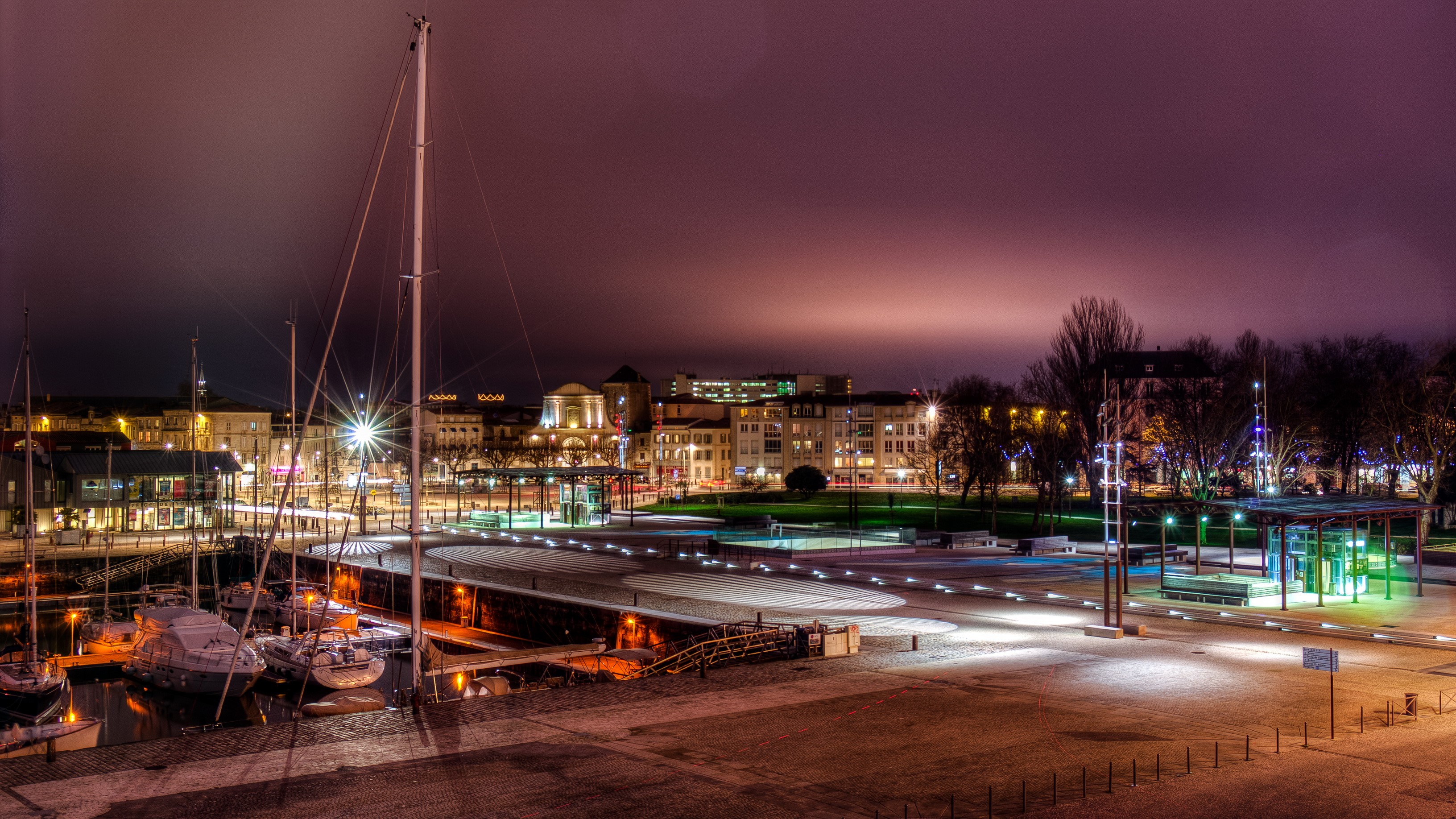 Night view of La Rochelle marina and city lights HD Wallpaper