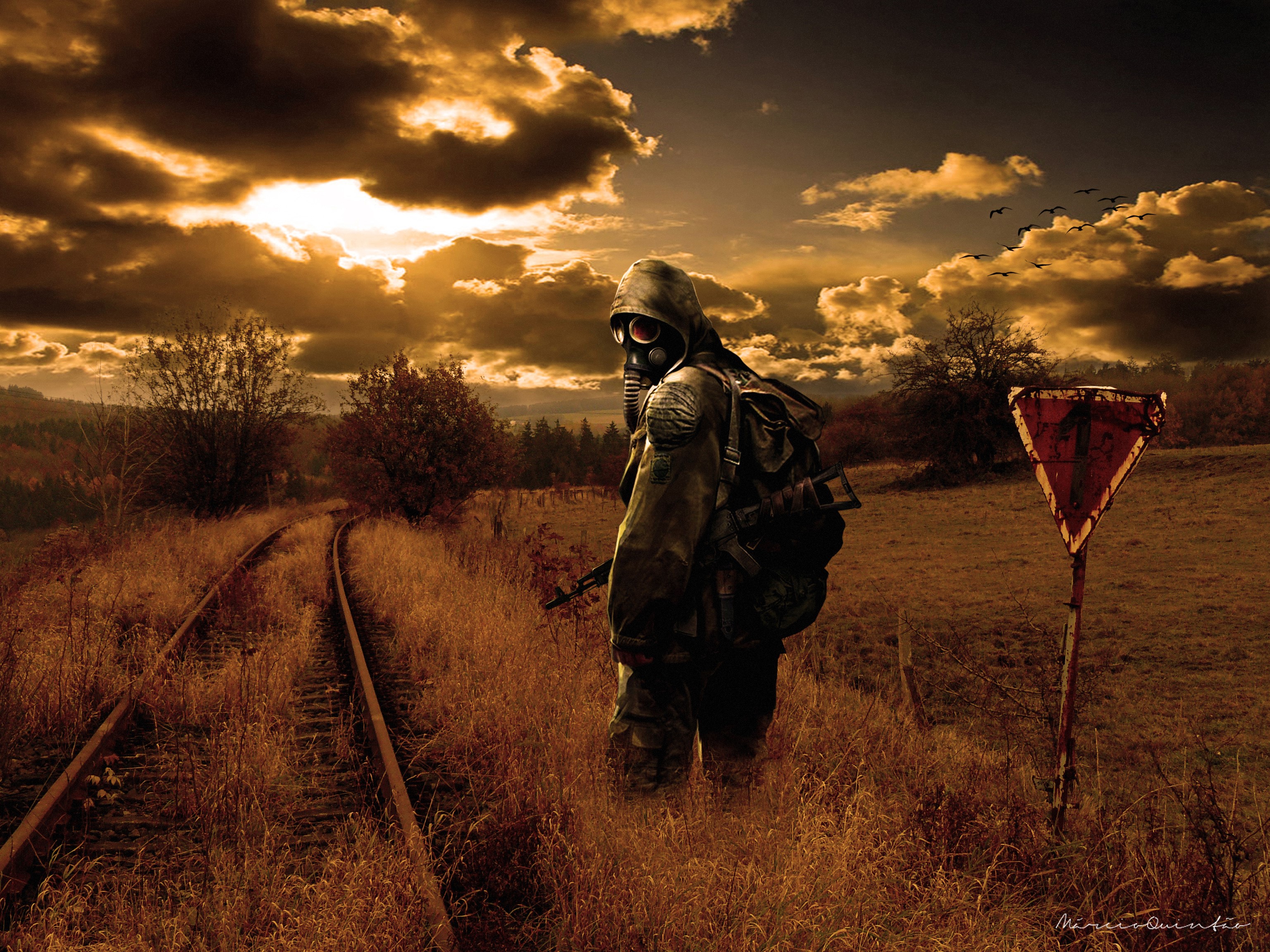 Stalker with gas mask on railroad tracks HD Wallpaper