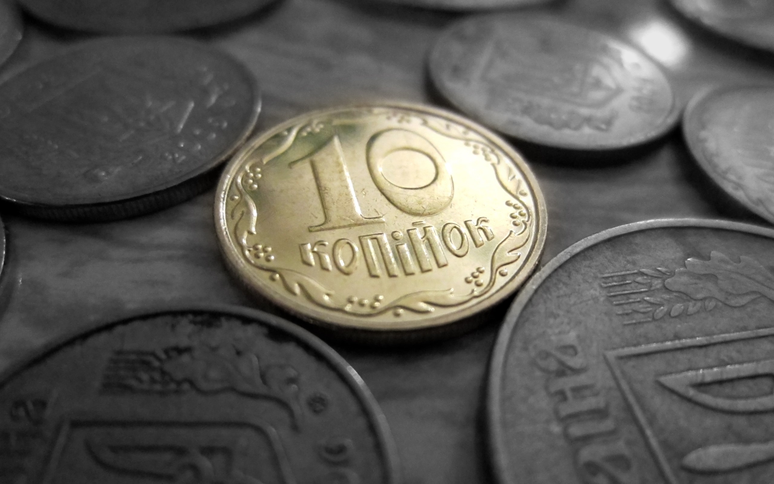 Ukrainian coins with 10 kopecks in focus HD Wallpaper