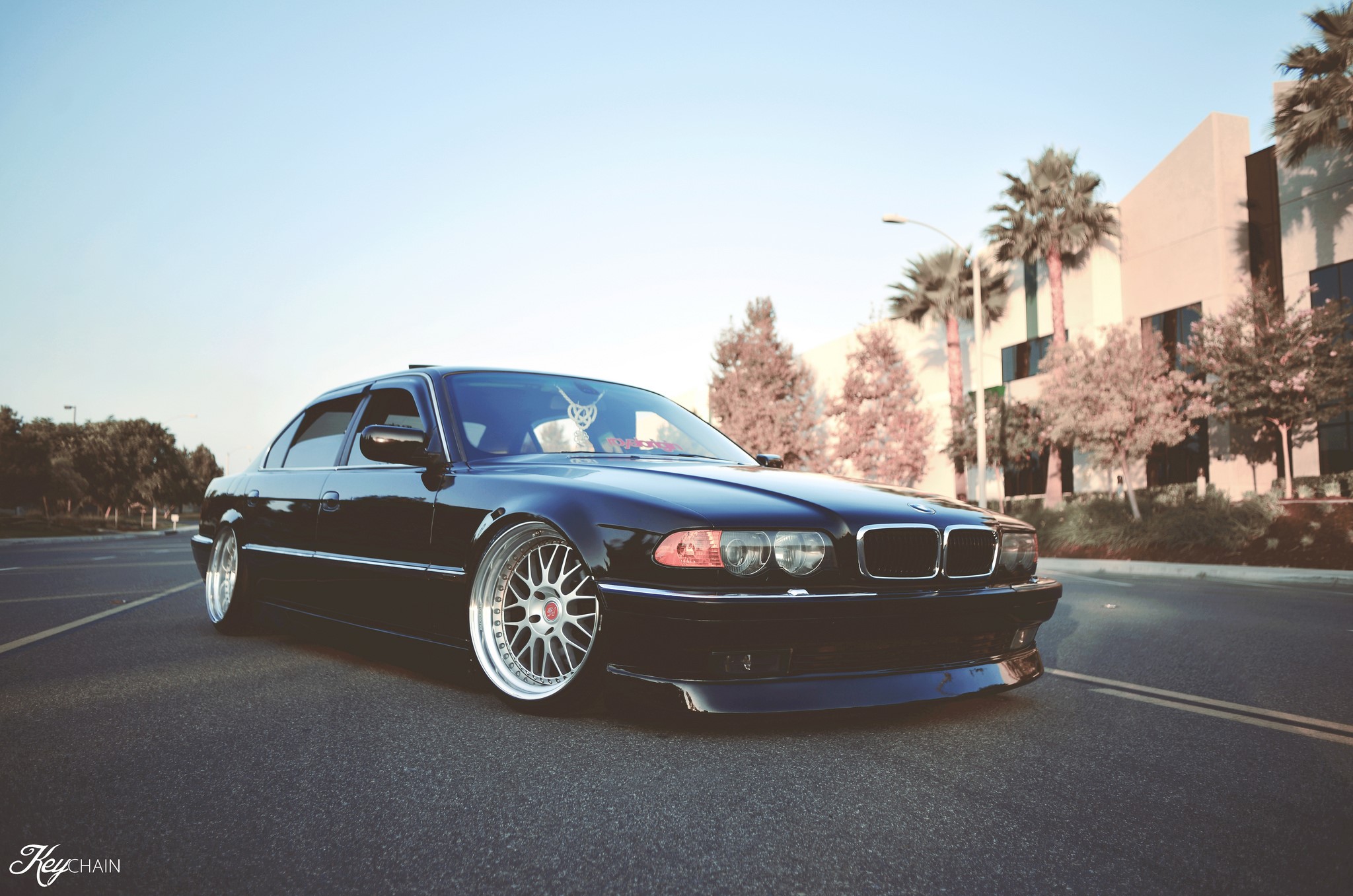 Black BMW 750iL E38 on a street HD Wallpaper