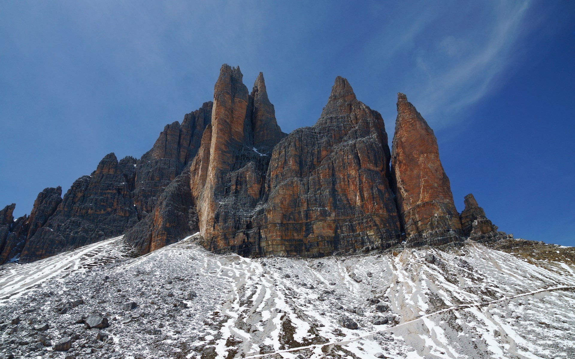 Tre Cime di Lavaredo mountains under a blue sky HD Wallpaper