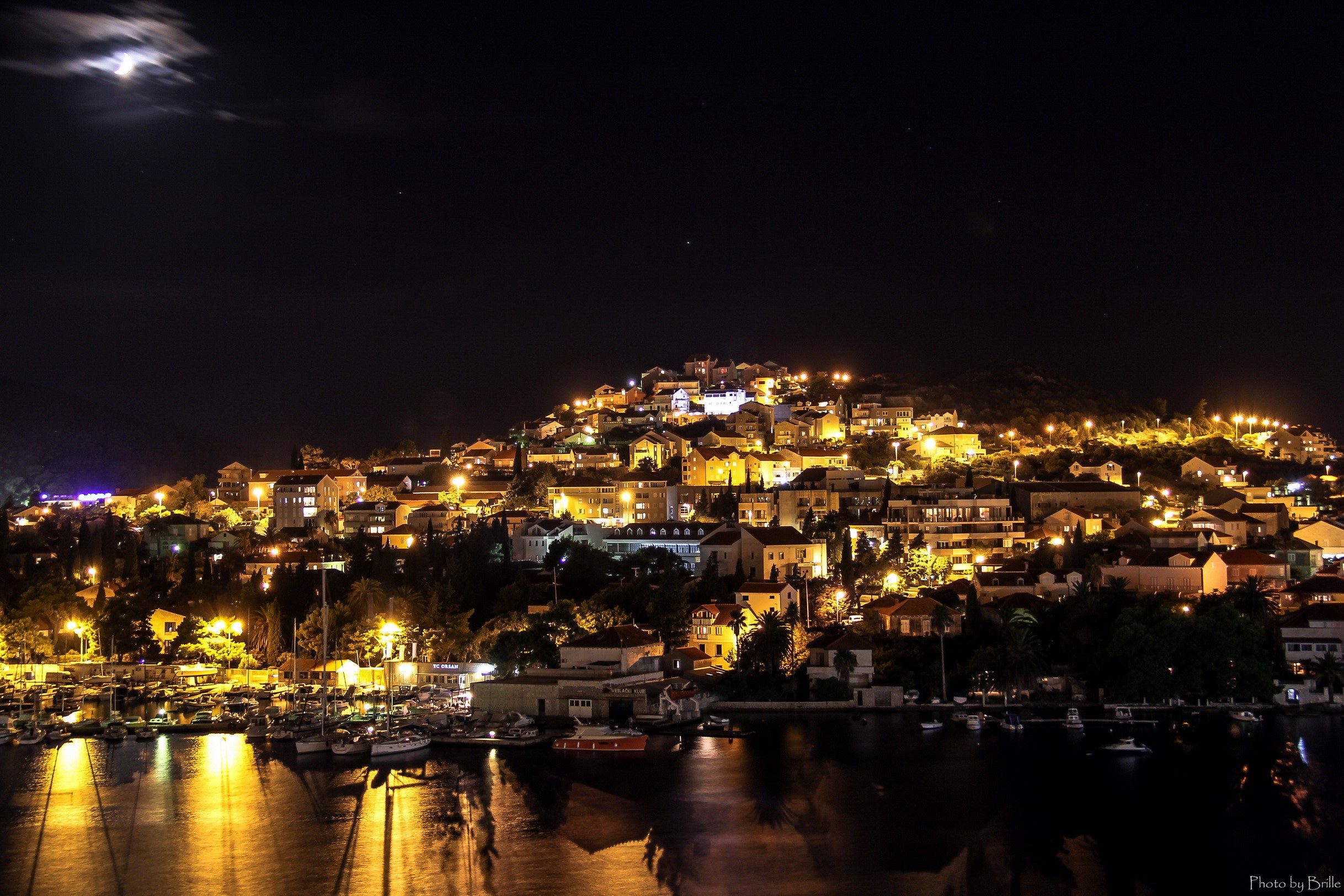 Dubrovnik at night with moon and harbor HD Wallpaper