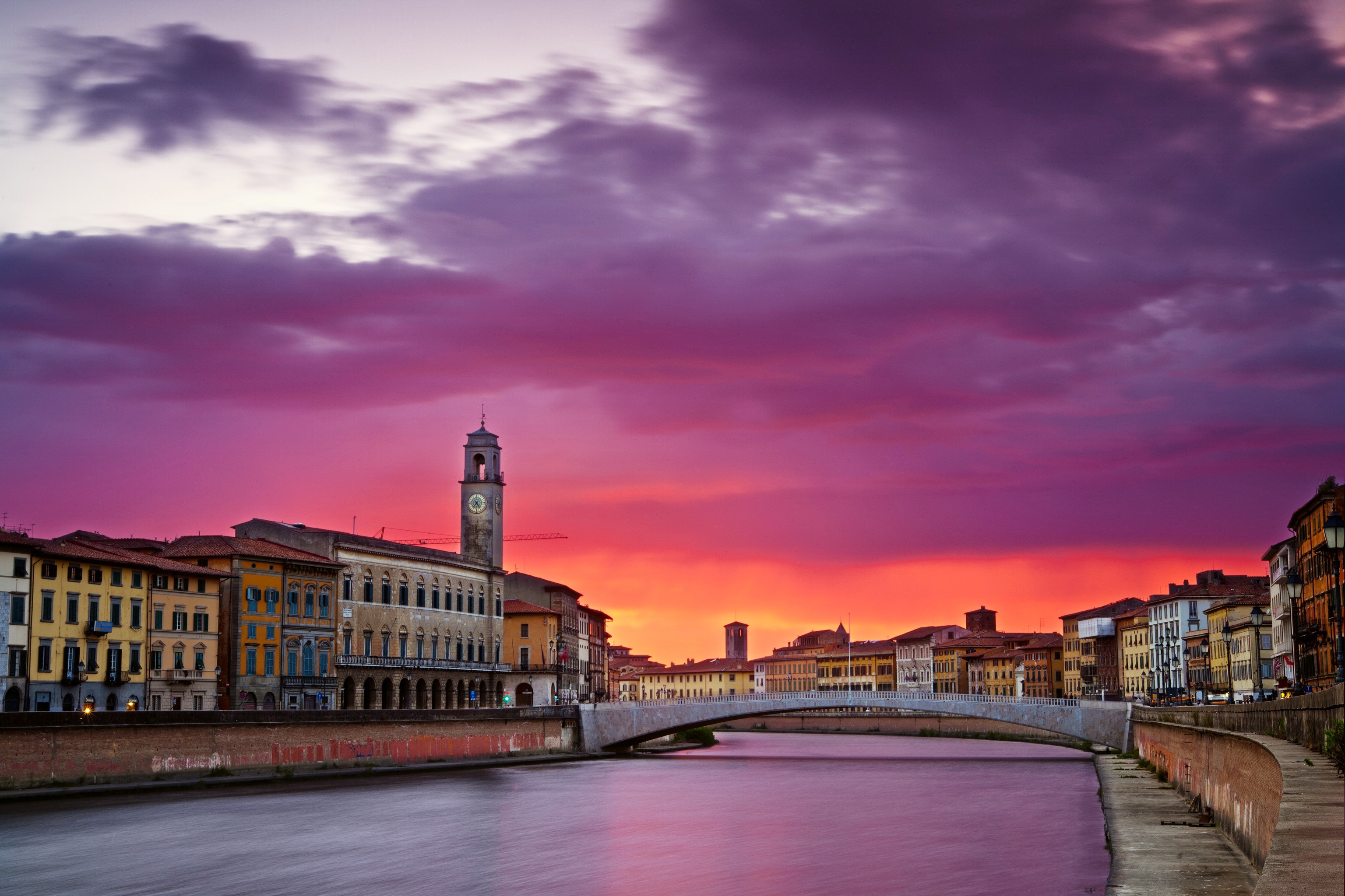 Pisa, Italy cityscape with river and bridge at sunset HD Wallpaper