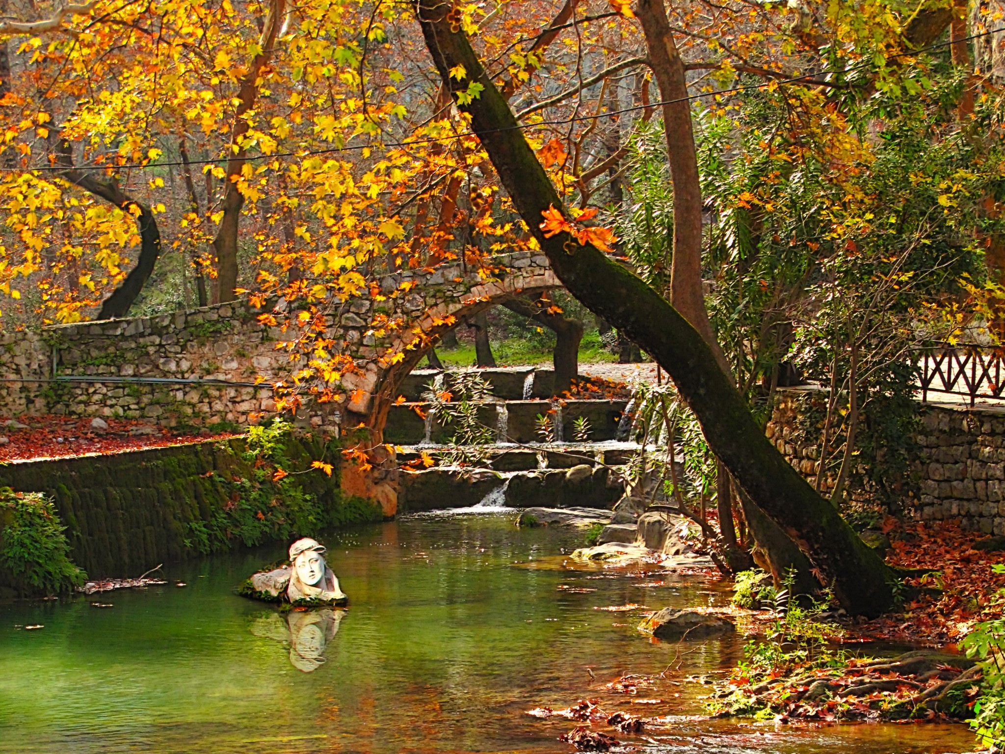 Stone bridge over a stream in autumn, Viotia, Greece HD Wallpaper