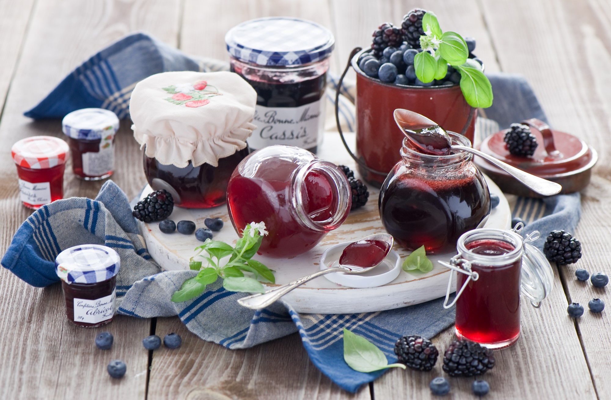 Jars of berry jam with fresh berries and spoons HD Wallpaper