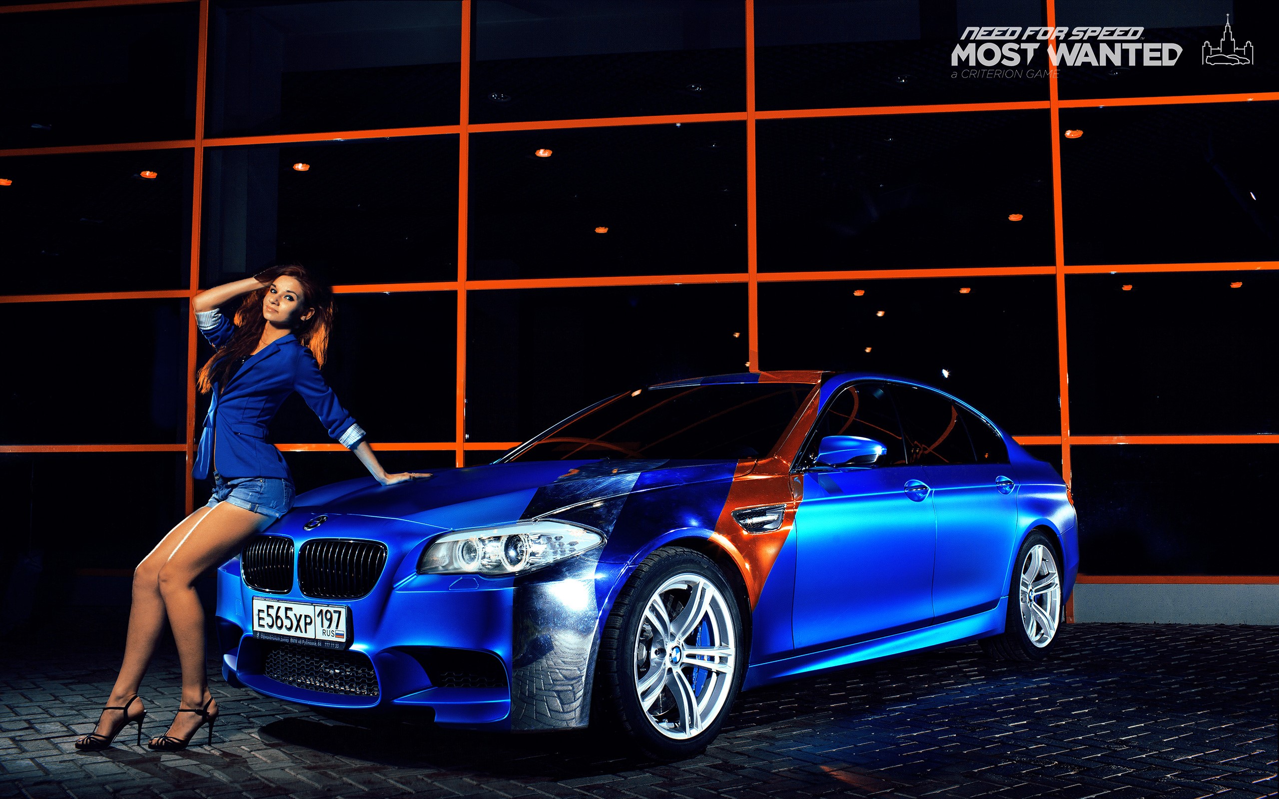 Woman posing with a blue BMW M5 HD Wallpaper