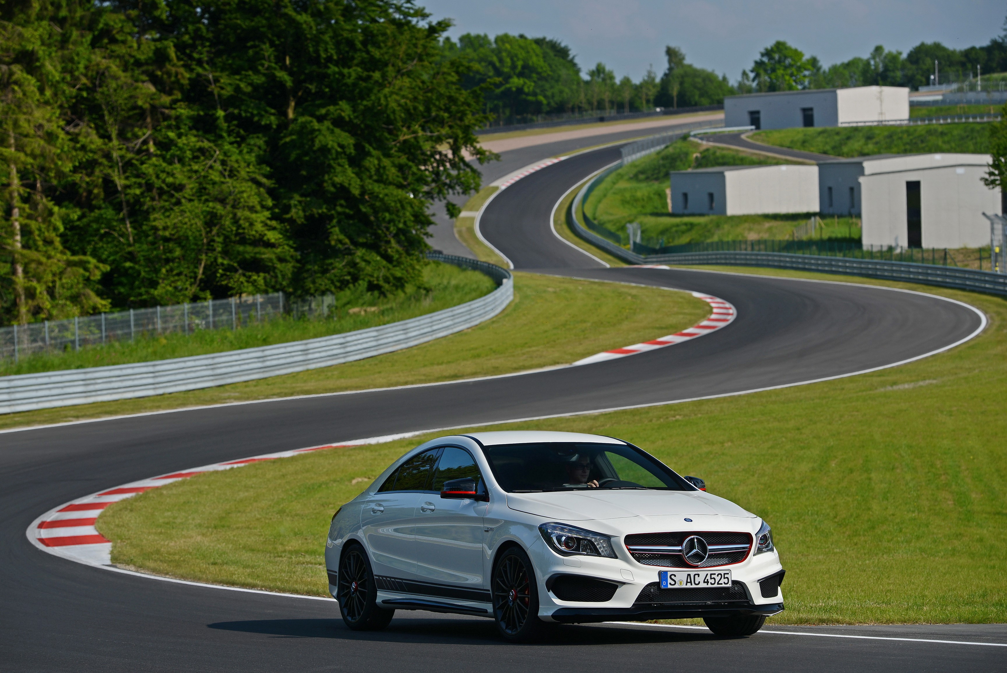 White Mercedes-Benz CLA 45 AMG Edition on a Race Track HD Wallpaper