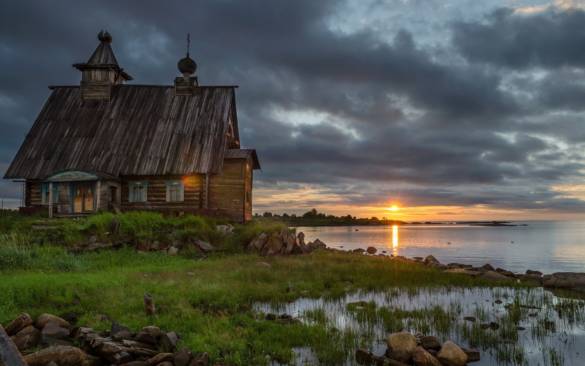 Wooden church by the sea at sunset HD Wallpaper