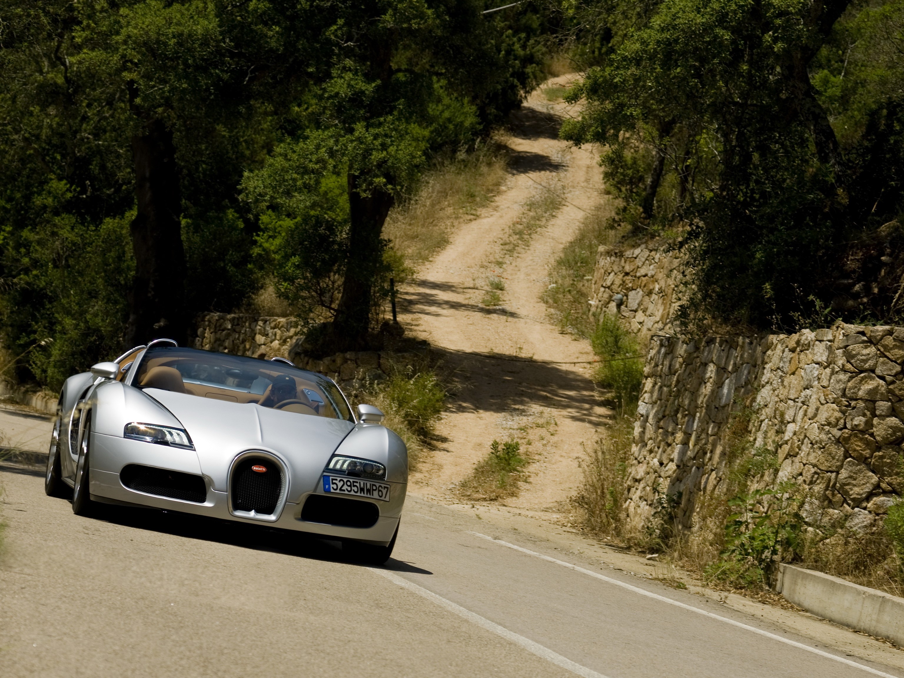 Bugatti Veyron 16.4 Grand Sport on a dirt road HD Wallpaper