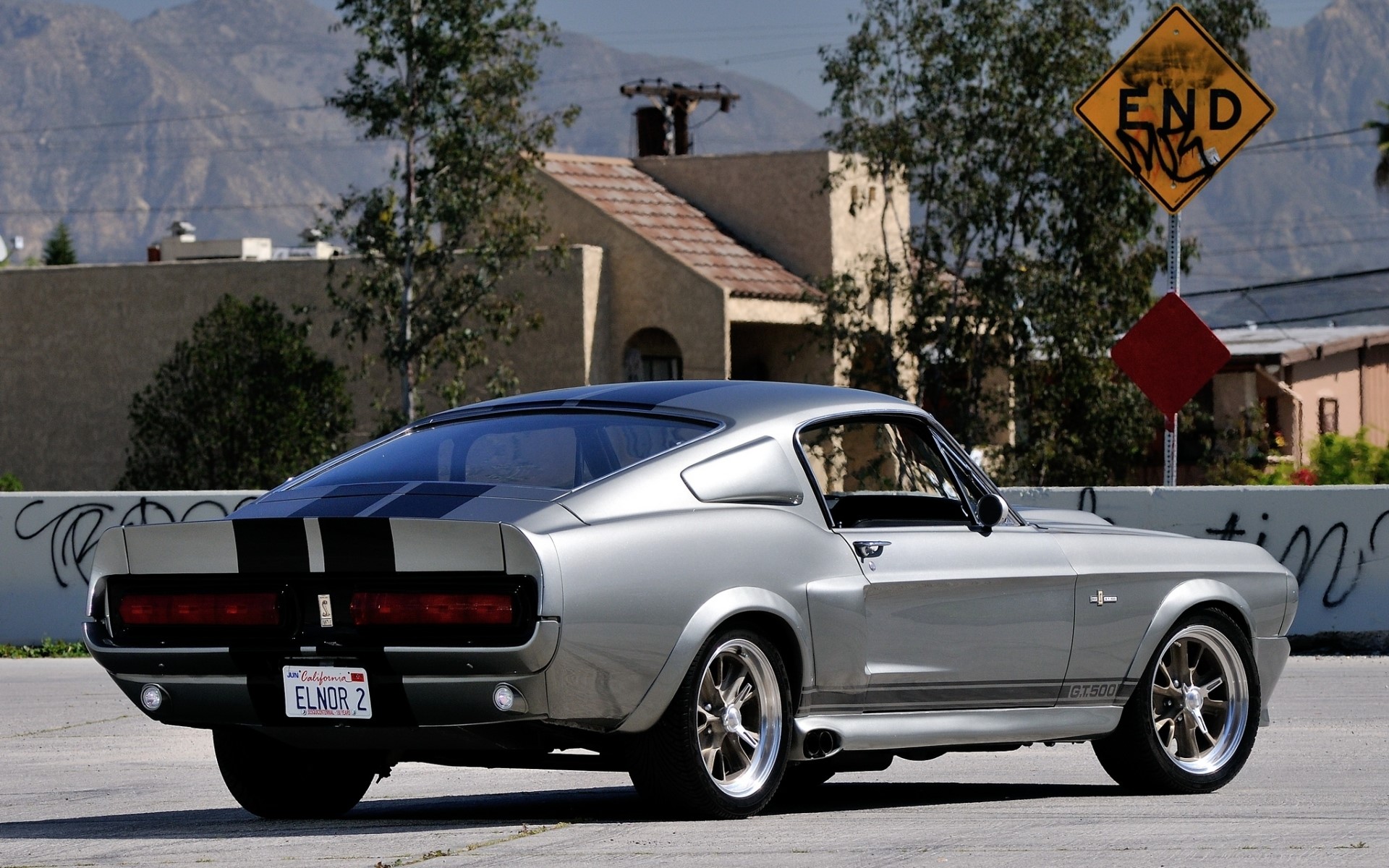 Silver Ford Mustang GT500 with racing stripes HD Wallpaper