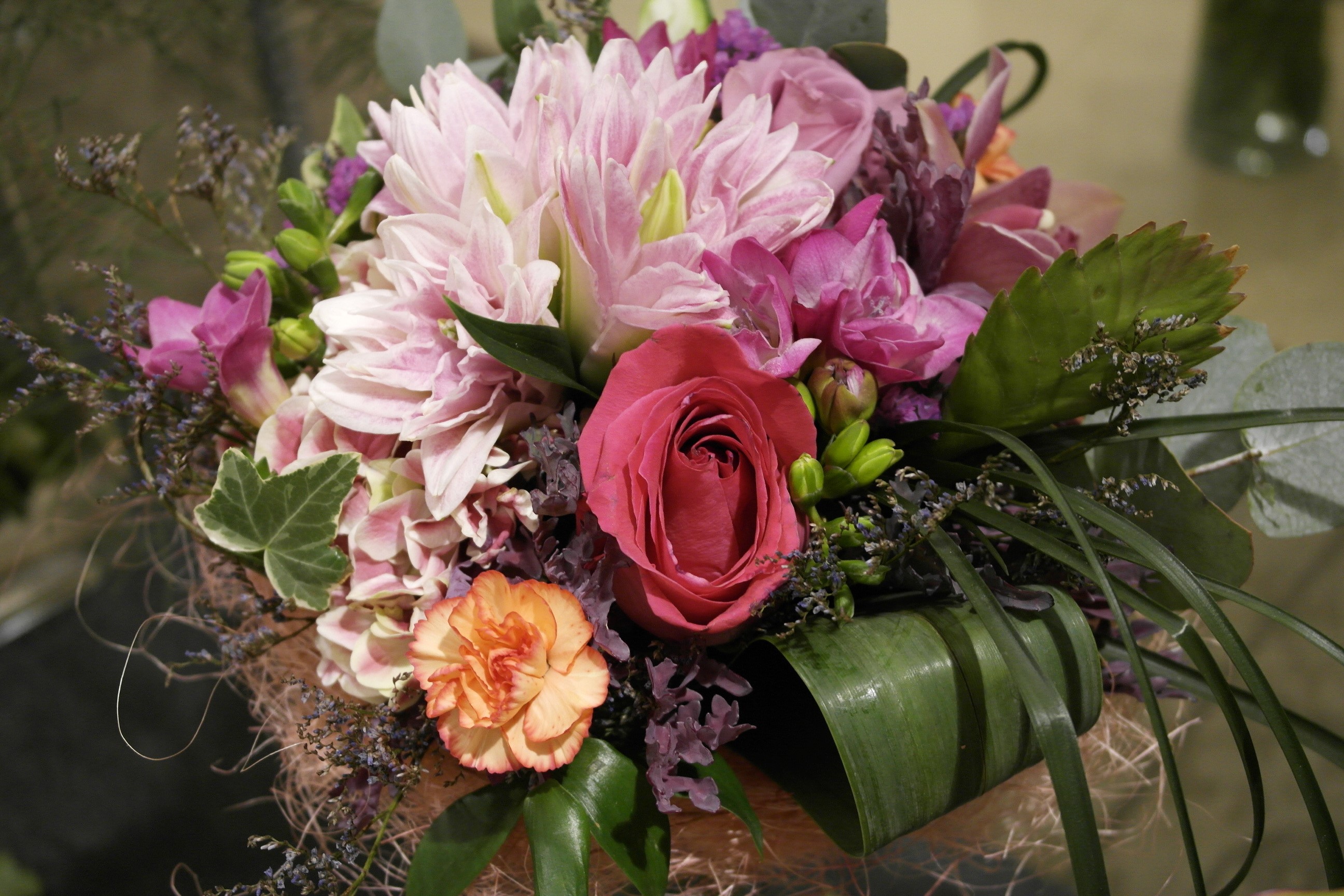 Pink and red floral arrangement with greenery HD Wallpaper