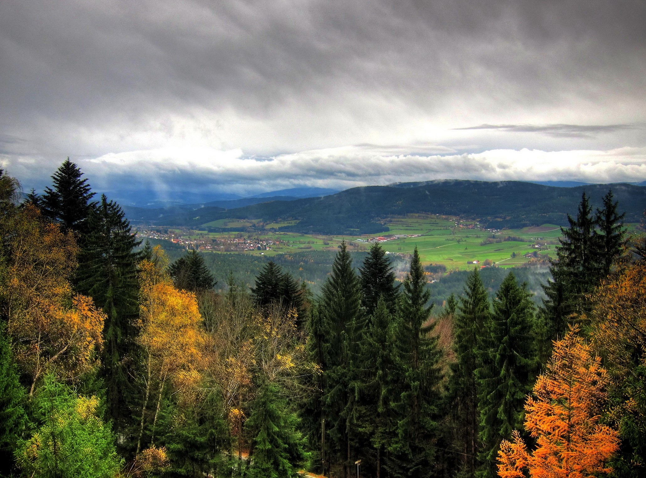 View of Arrach, Bavaria, Germany from a forest HD Wallpaper