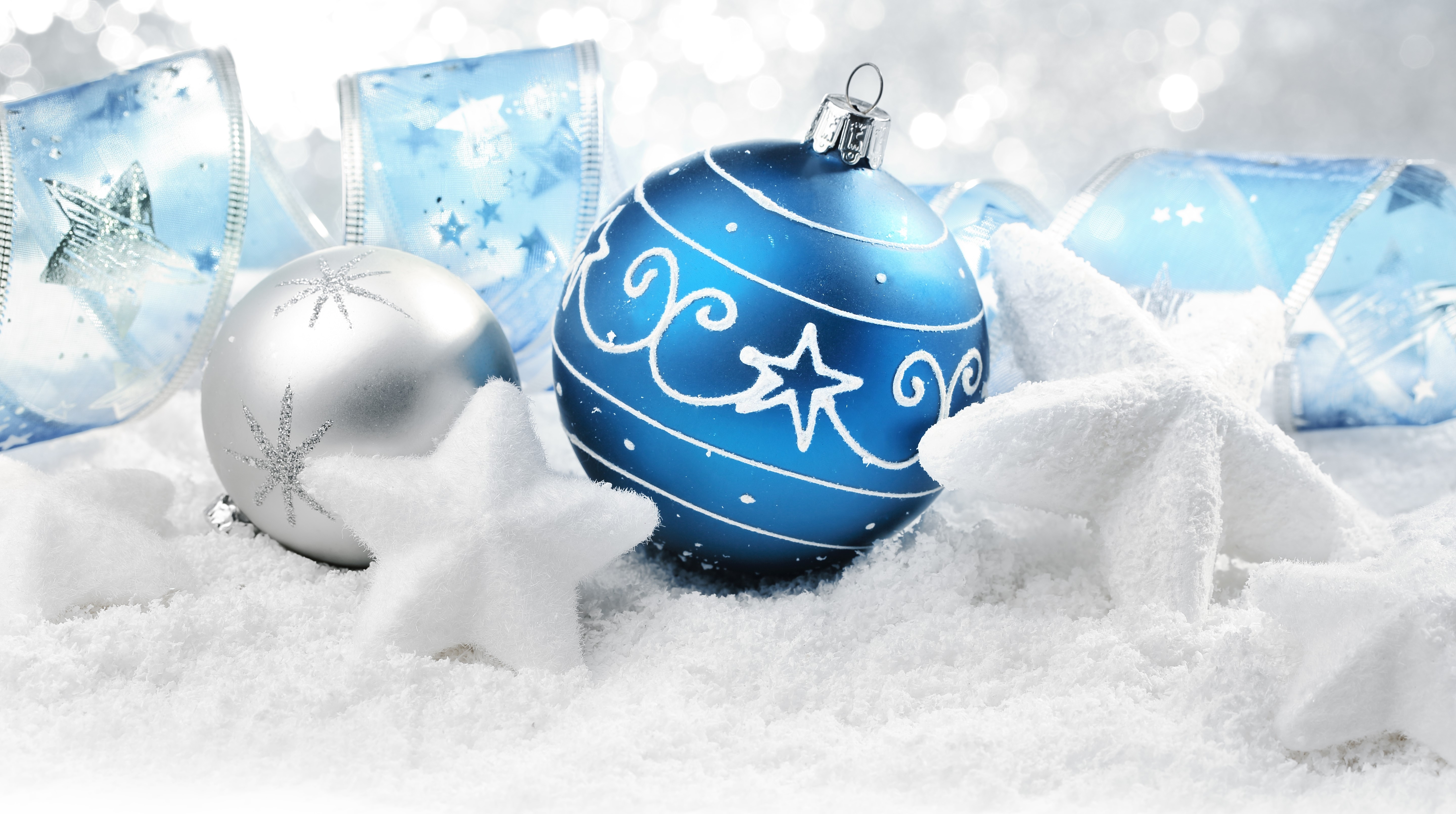Christmas ornaments and stars in snow HD Wallpaper