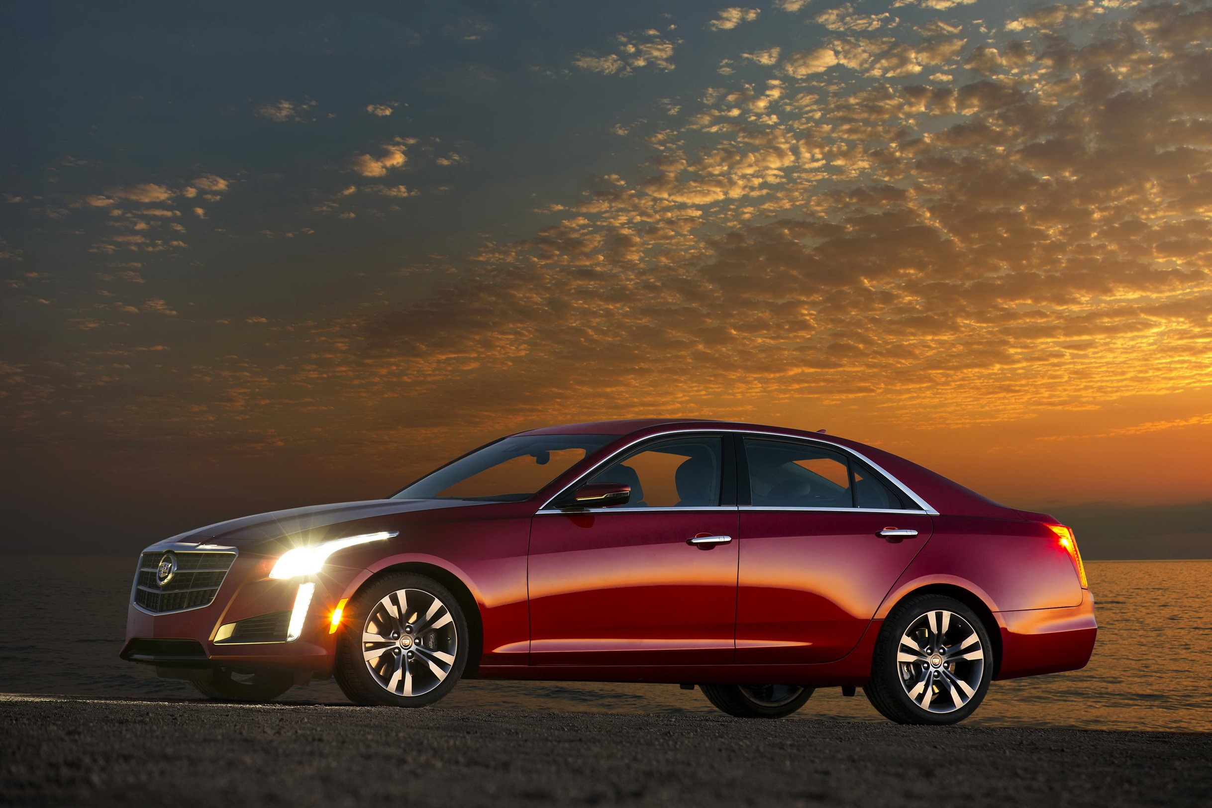 Red Cadillac CTS Vsport sedan at sunset HD Wallpaper