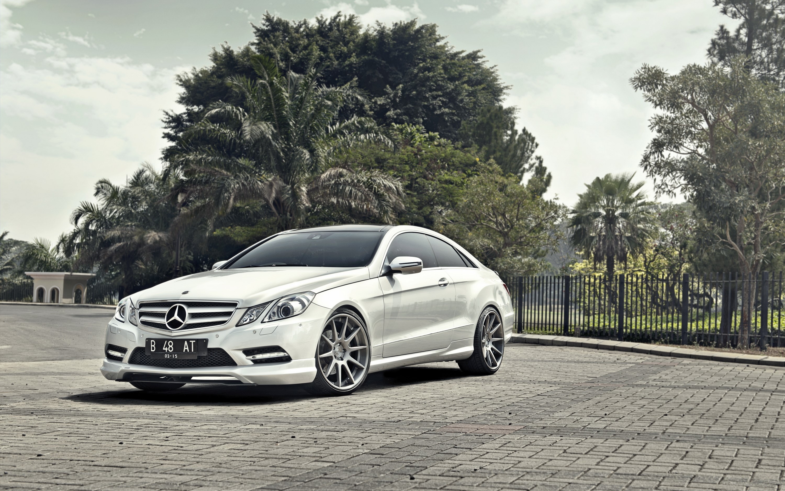 White Mercedes-Benz E-Class Coupe on Pavement HD Wallpaper