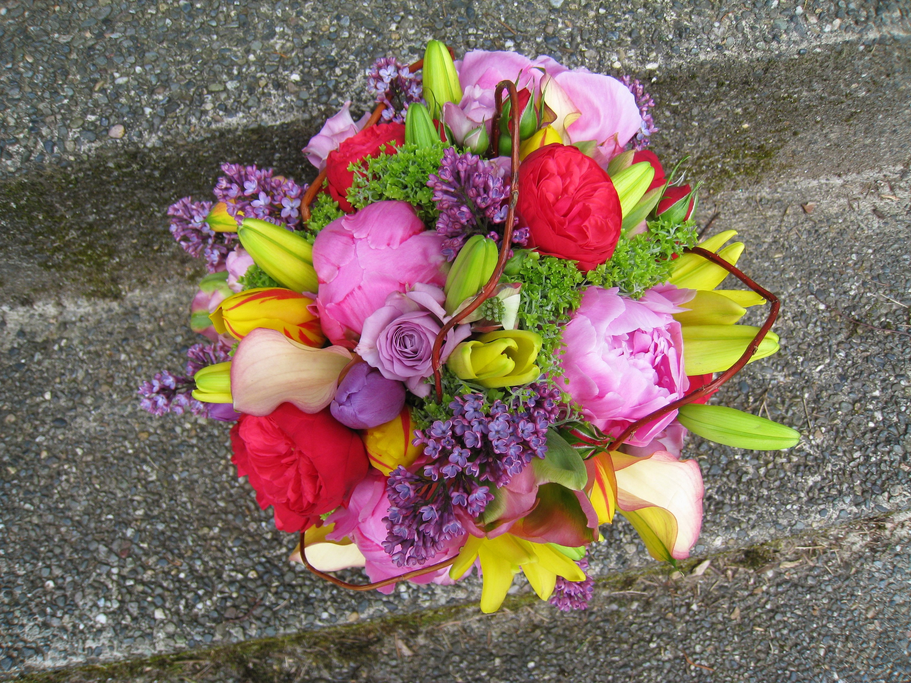 Colorful bouquet of flowers on a textured surface HD Wallpaper