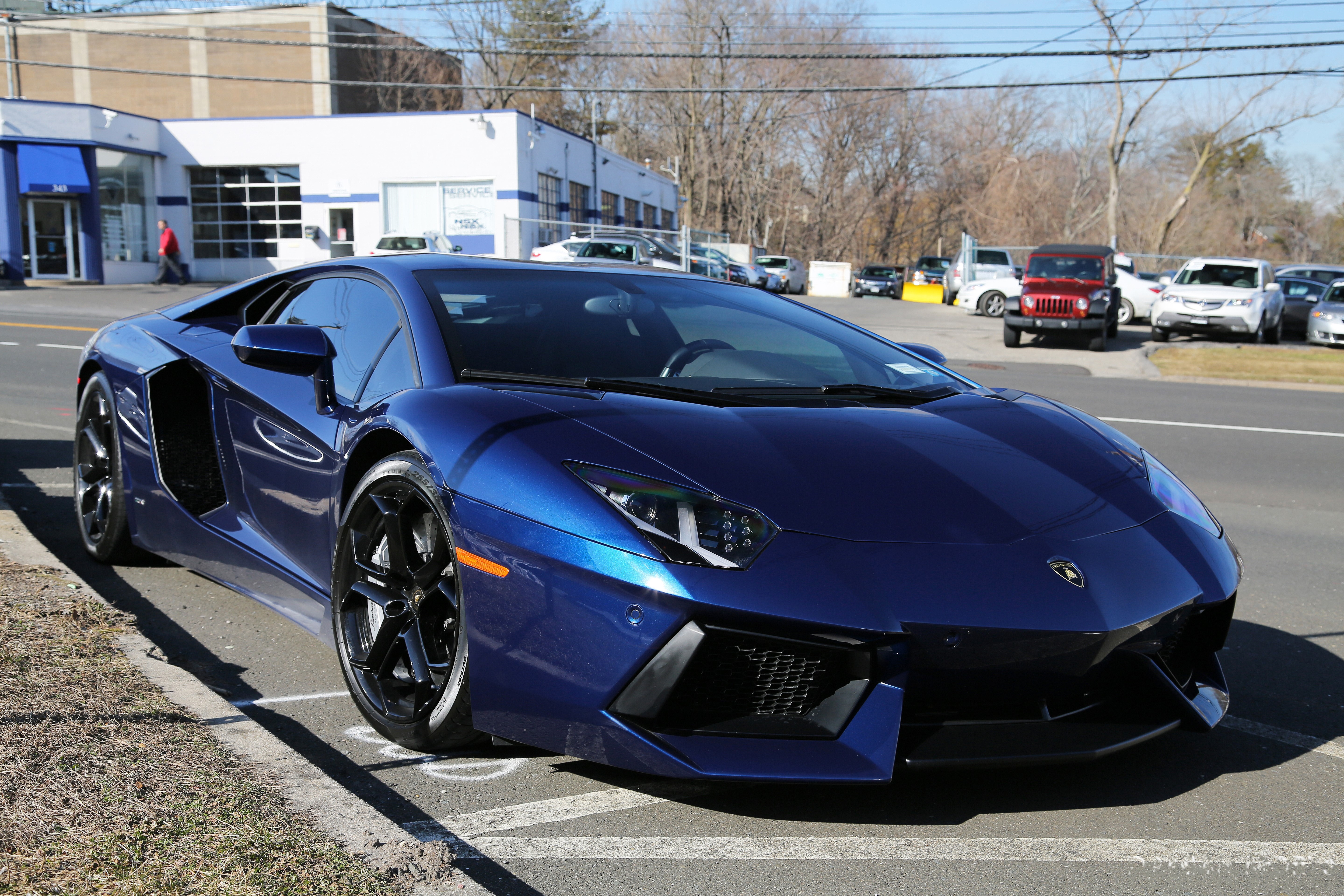 Blue Lamborghini Aventador LP700-4 parked on street HD Wallpaper