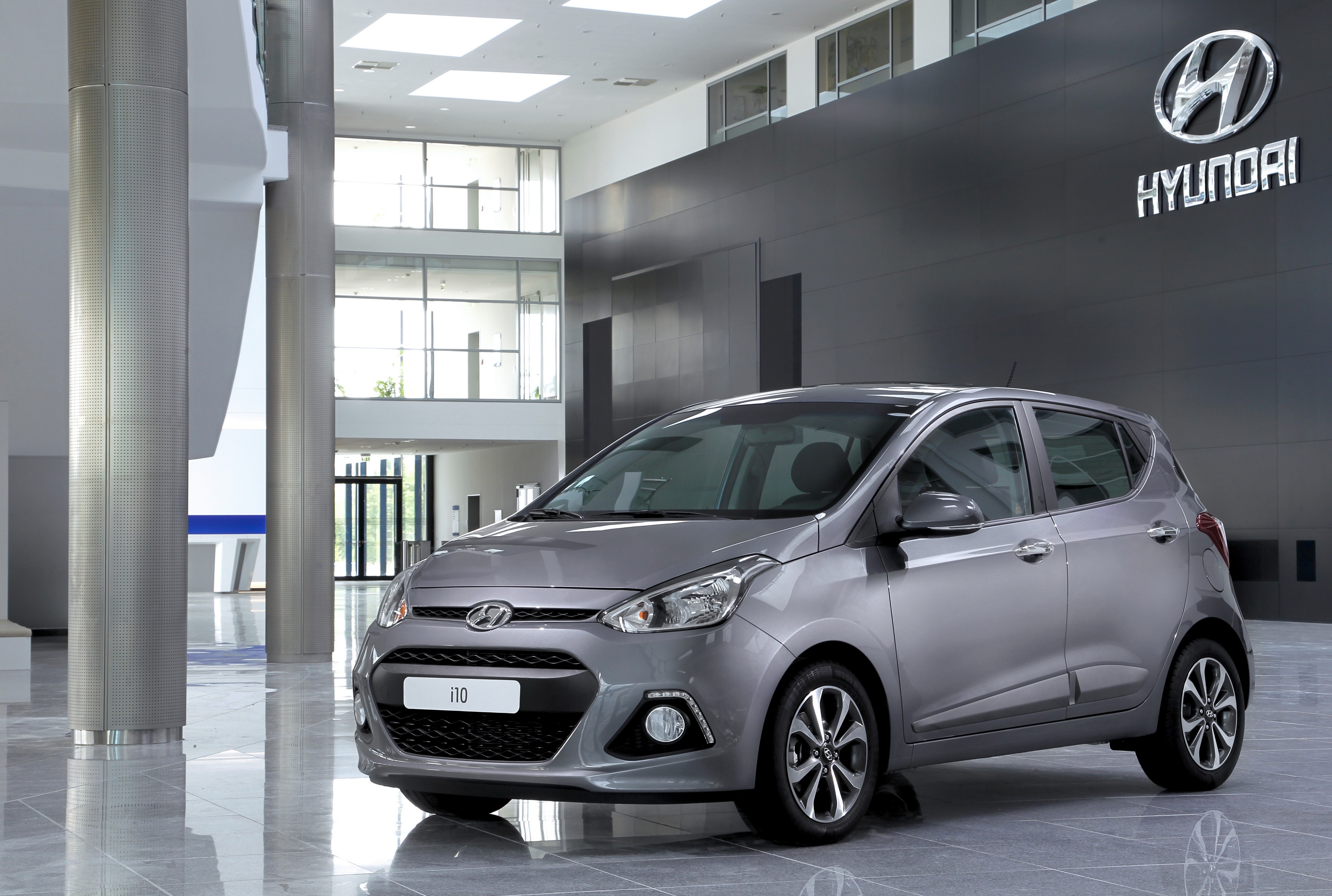 2013 Hyundai i10 in a showroom HD Wallpaper