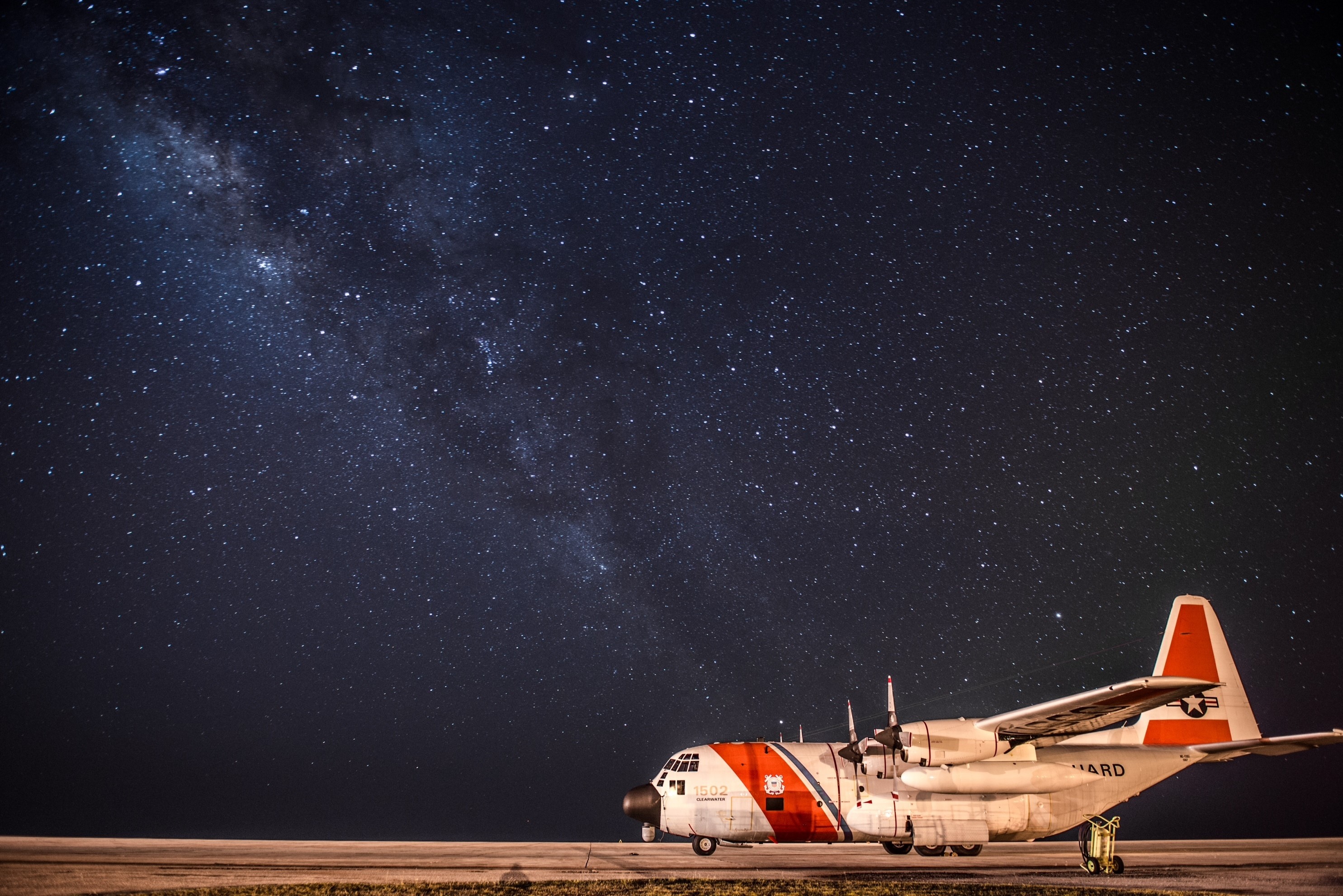 US Coast Guard C-130 Hercules under the Milky Way HD Wallpaper