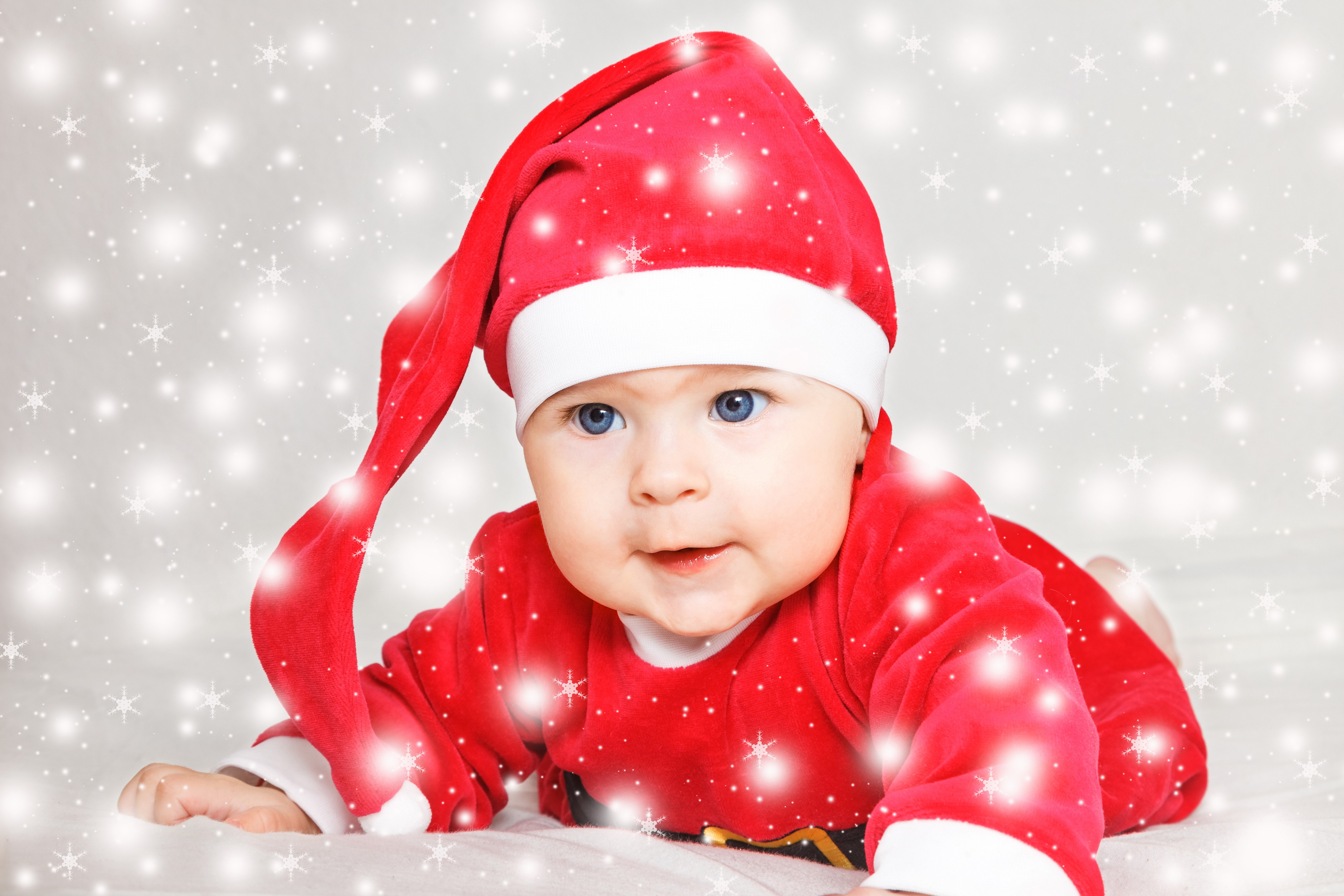 Baby in Santa Hat with Snowflakes HD Wallpaper