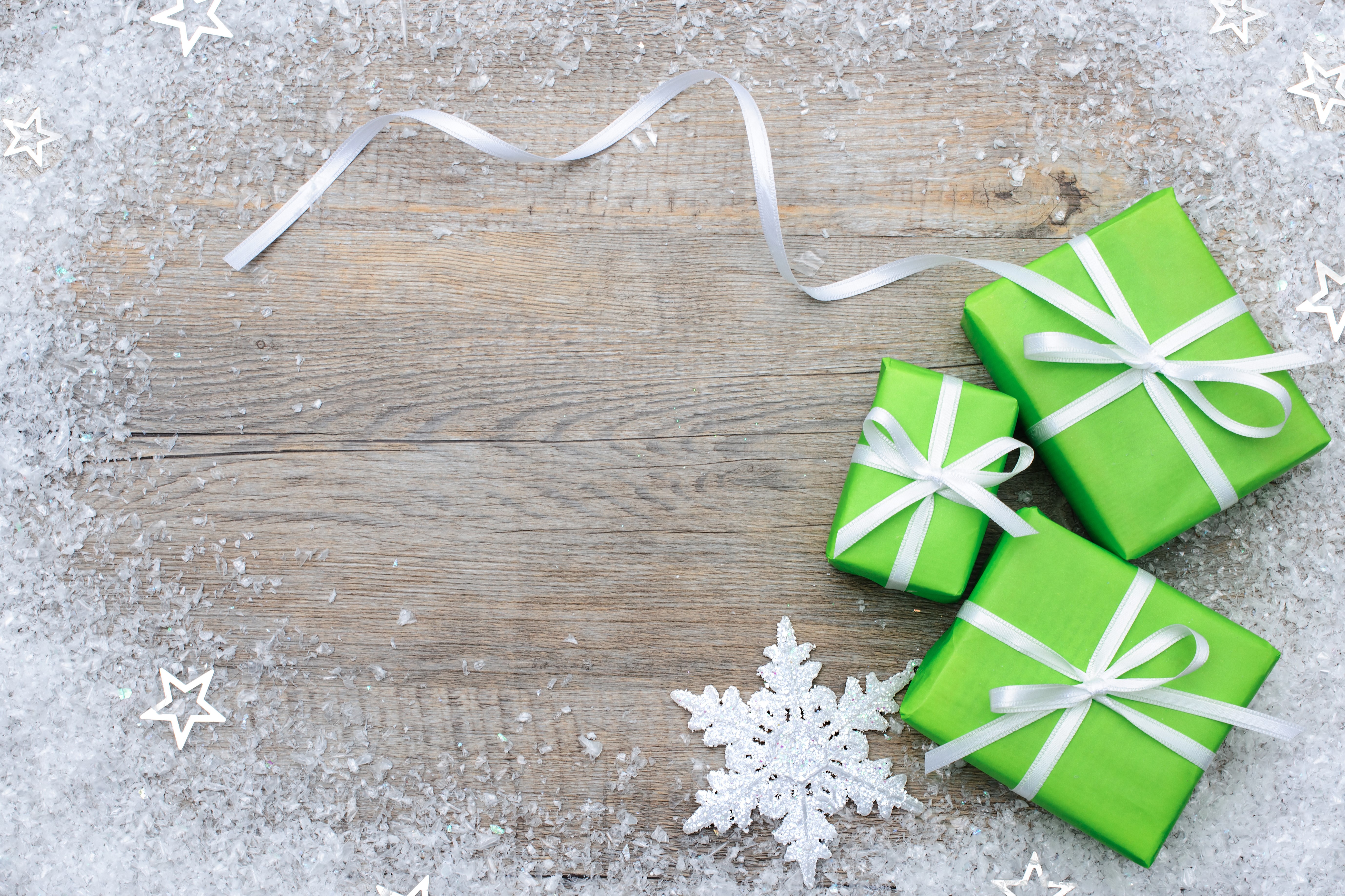 Christmas Gifts with Snow and Ribbon on Wood HD Wallpaper