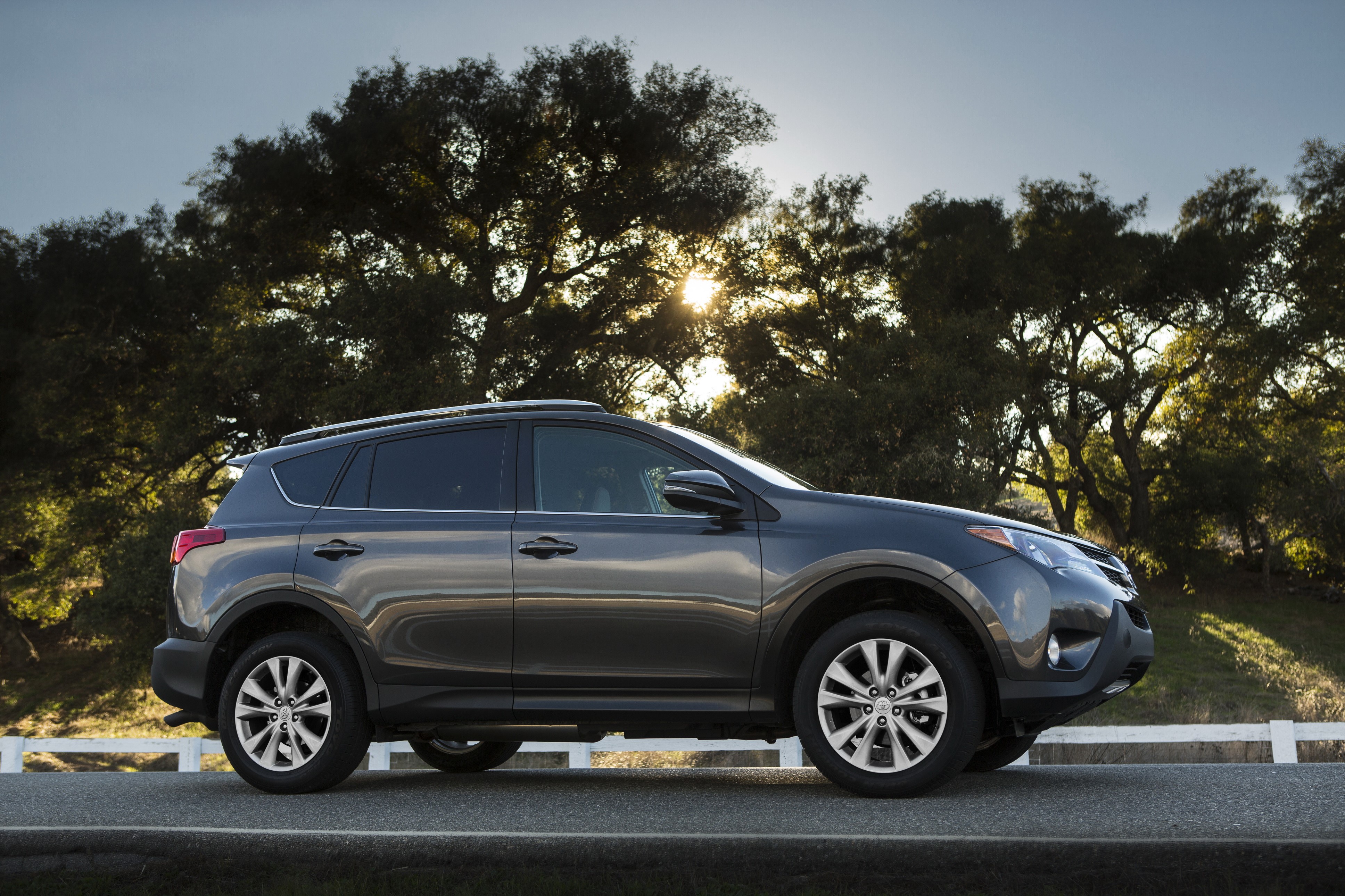 2013 Toyota RAV4 parked on a road HD Wallpaper
