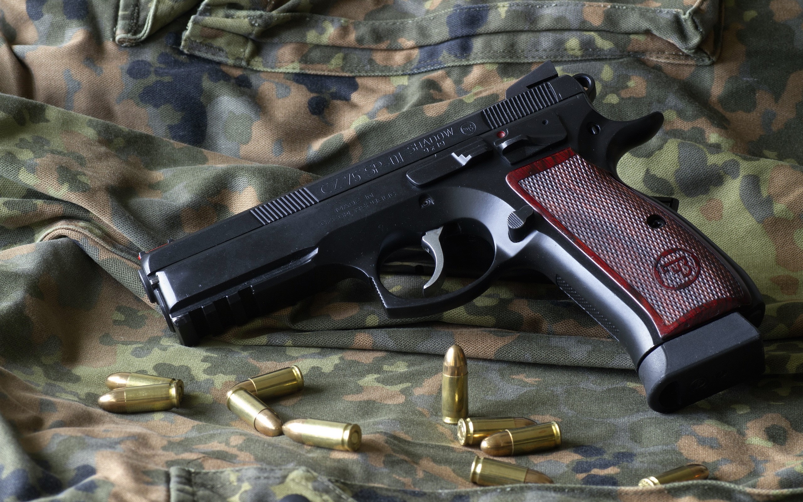 CZ75 SP-01 Shadow pistol with cartridges HD Wallpaper