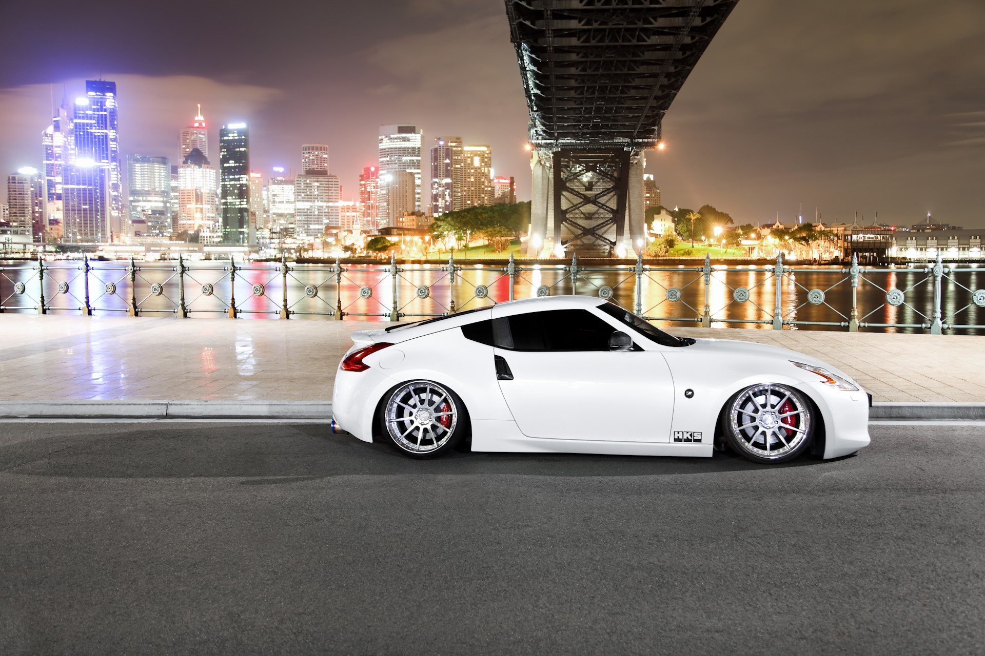 White Nissan 370Z parked by a bridge at night HD Wallpaper