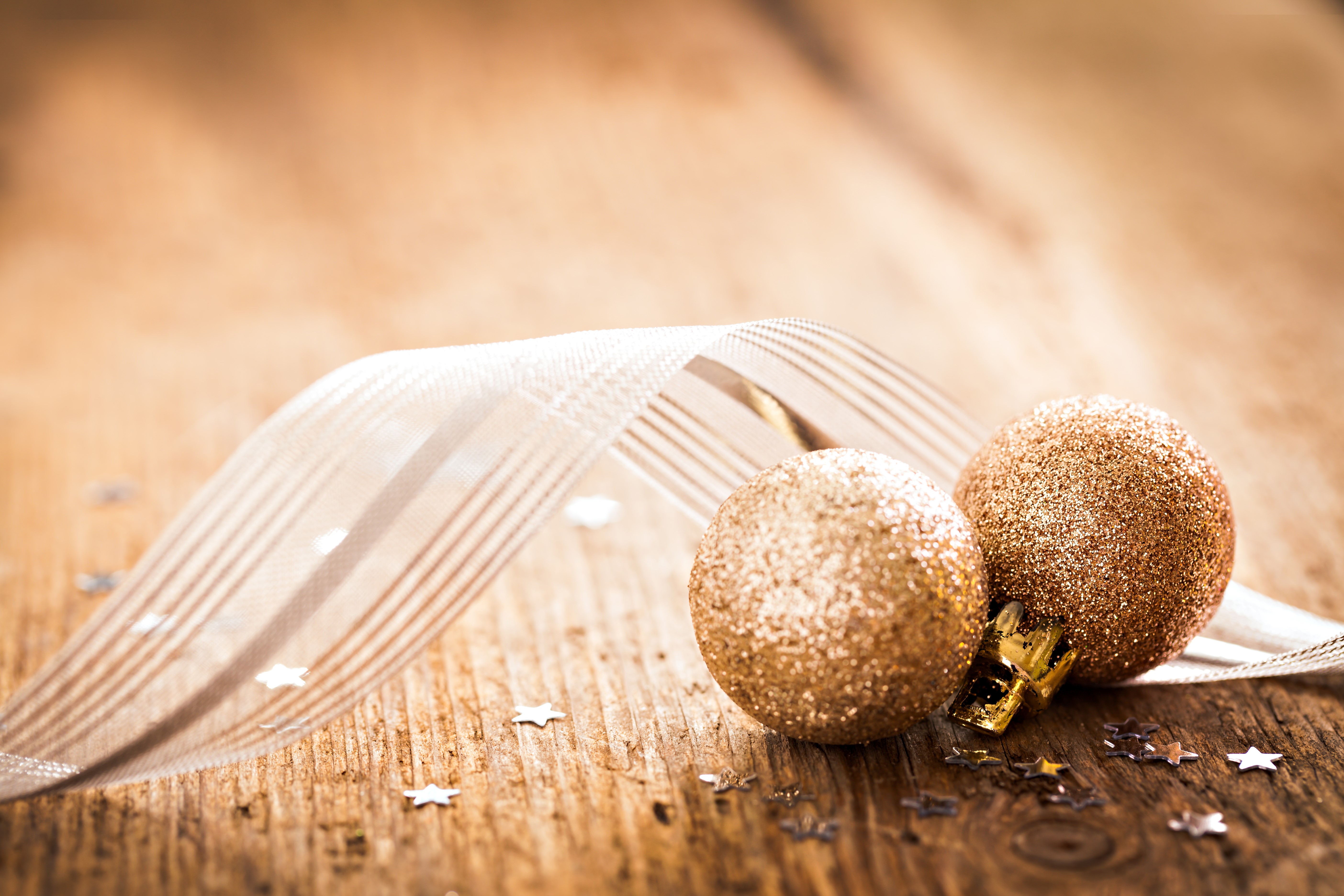 Christmas balls and ribbon on wooden background HD Wallpaper