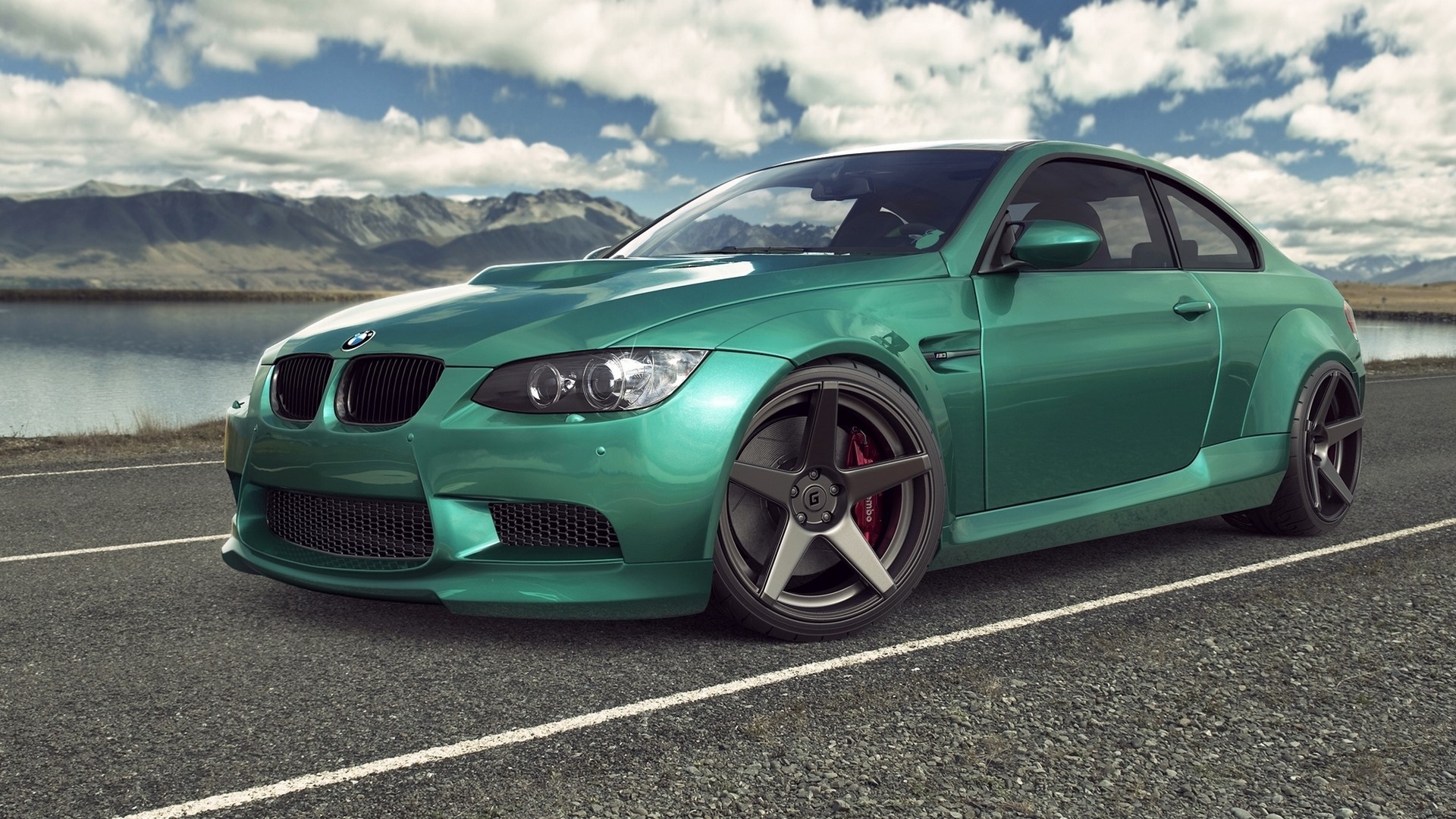 Green BMW M3 E92 parked by a lake HD Wallpaper