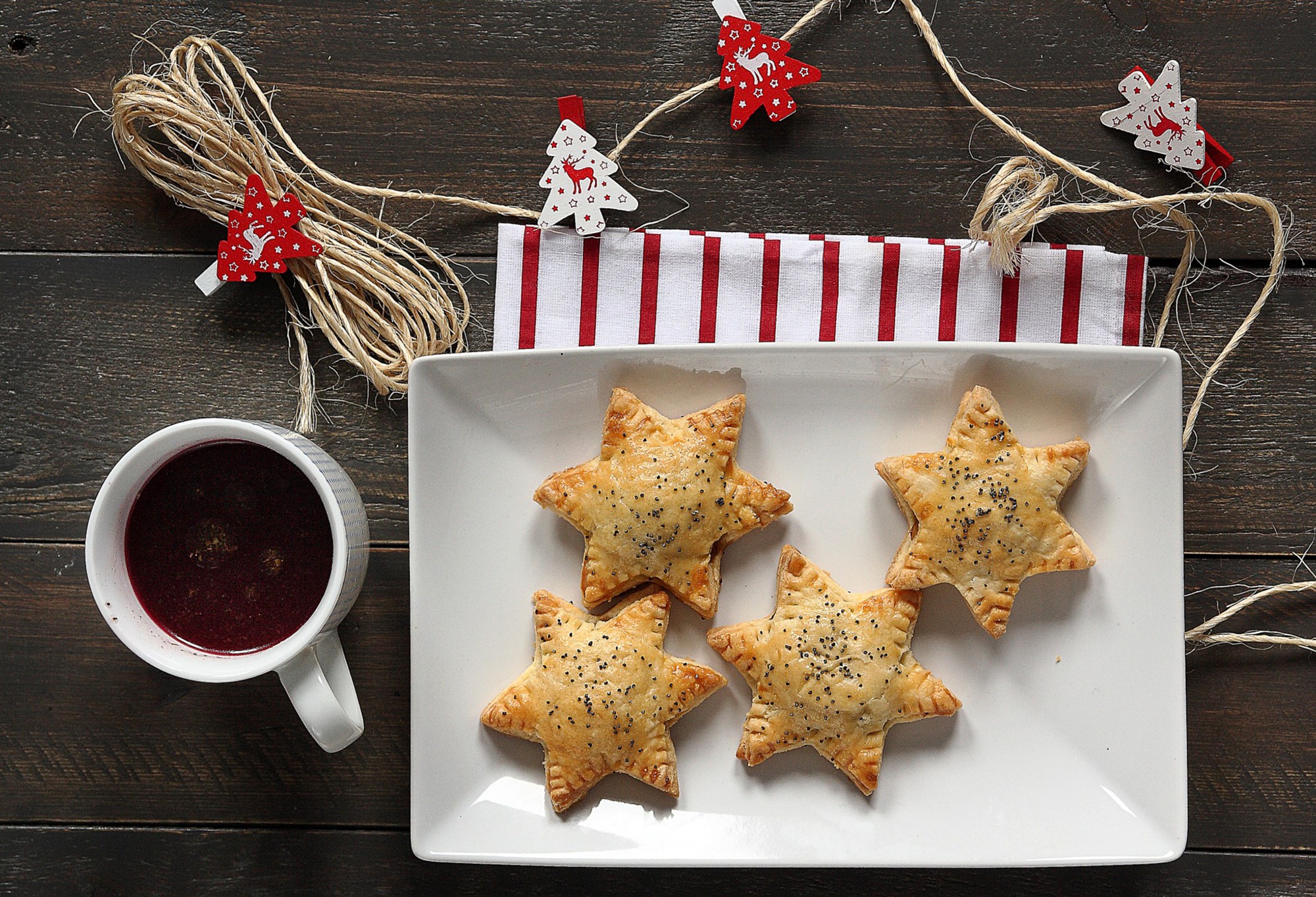 Star pastries and cup of drink on wooden table HD Wallpaper