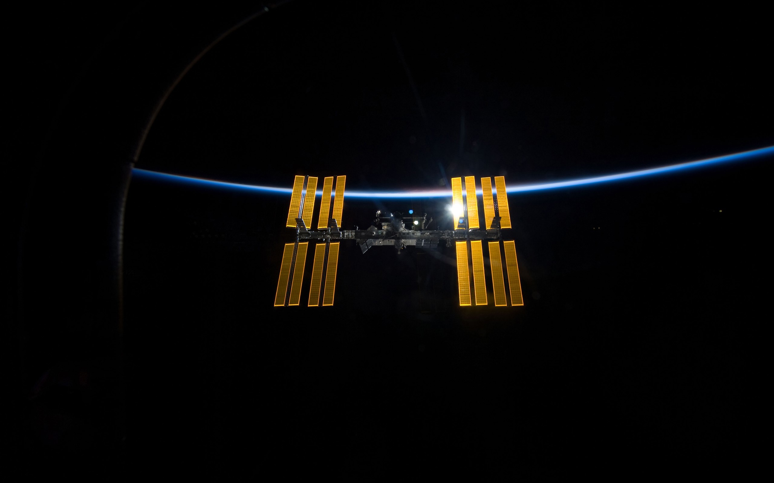 International Space Station orbiting Earth HD Wallpaper