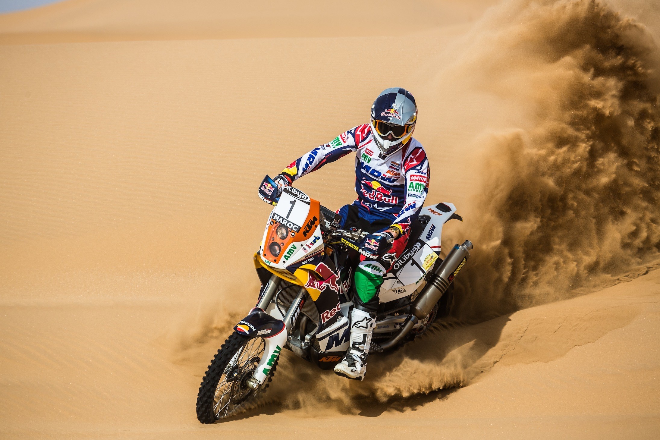 Motorcyclist racing through desert sand HD Wallpaper