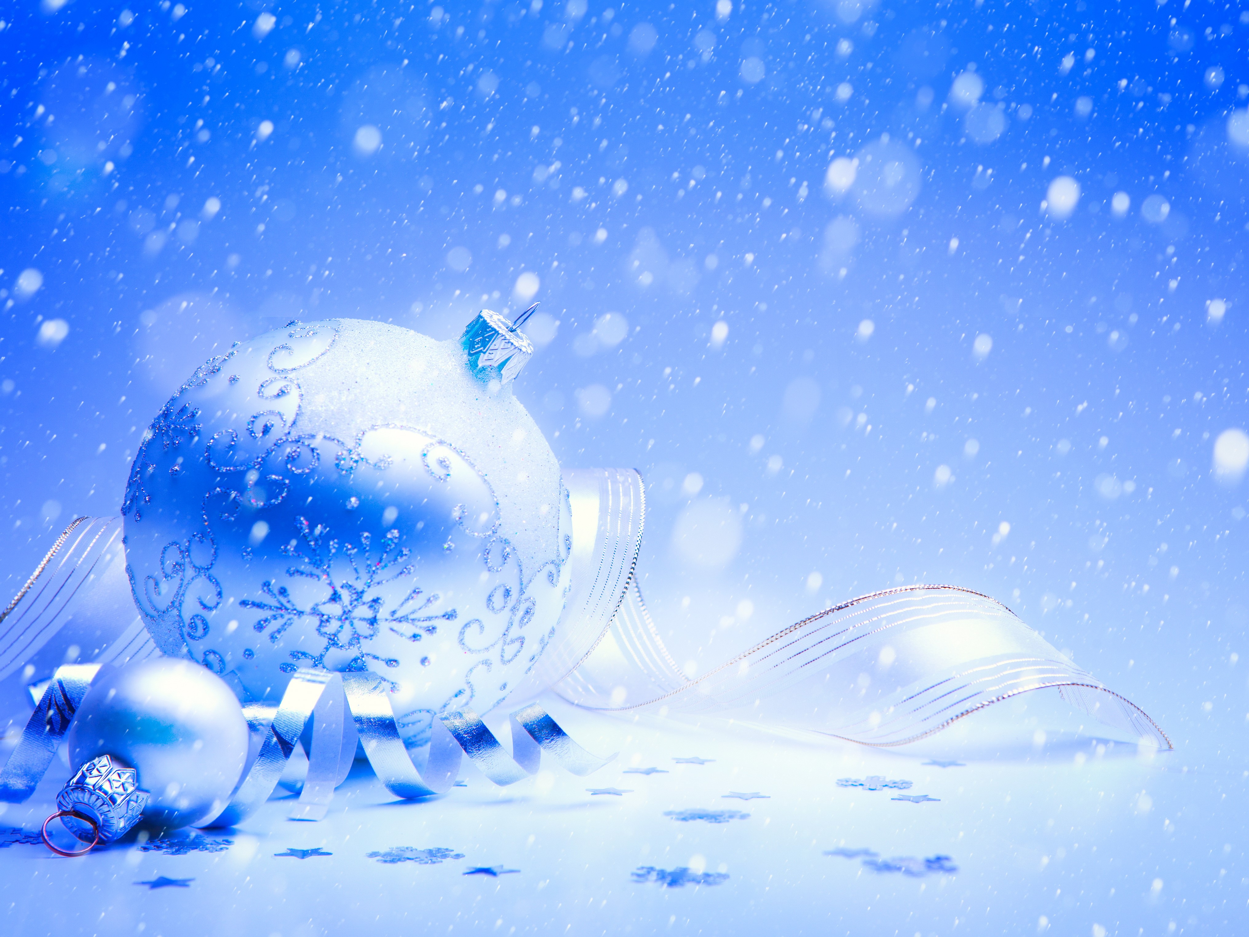 Christmas ornaments and ribbon with falling snow HD Wallpaper
