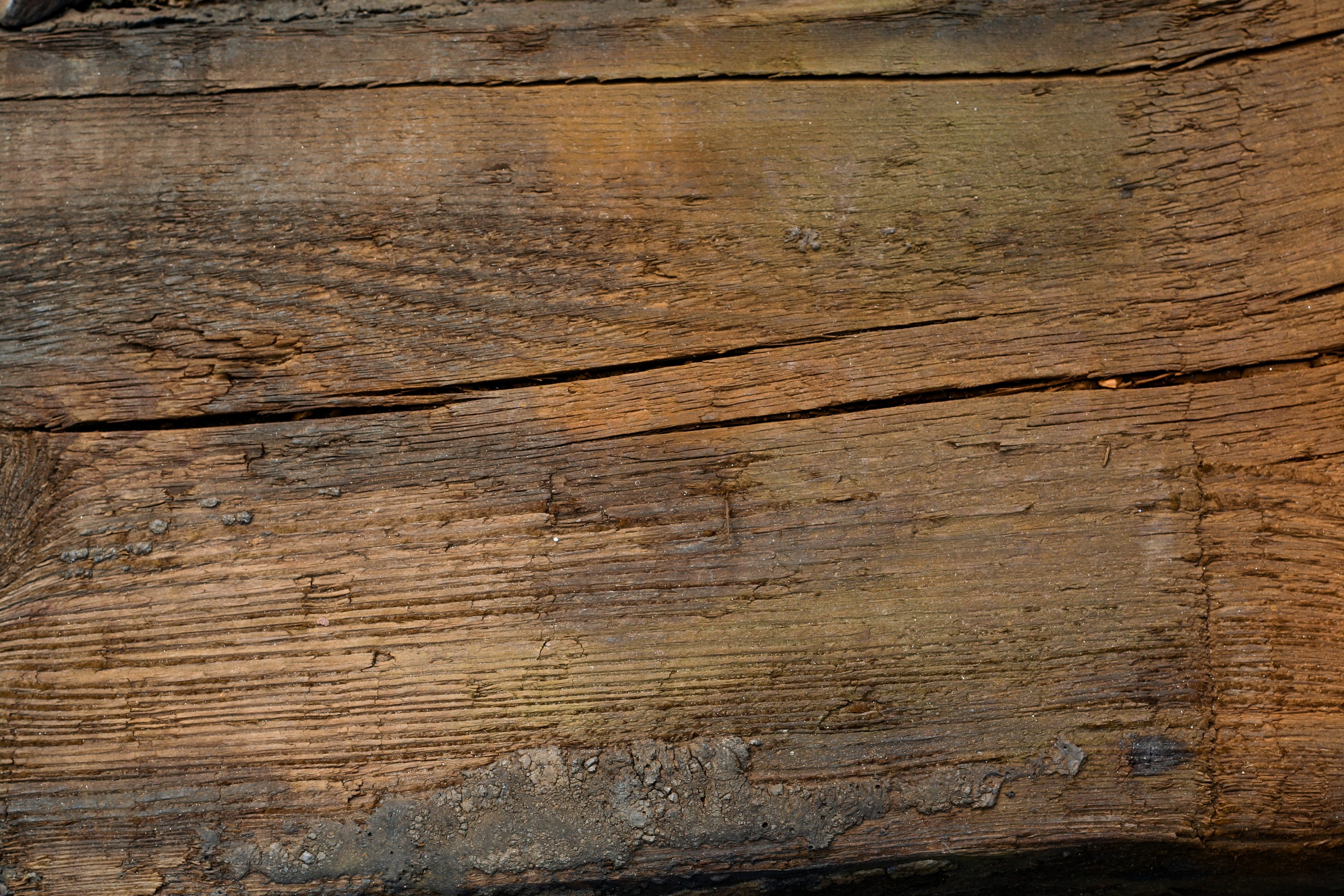Close-up of weathered wooden texture with cracks HD Wallpaper