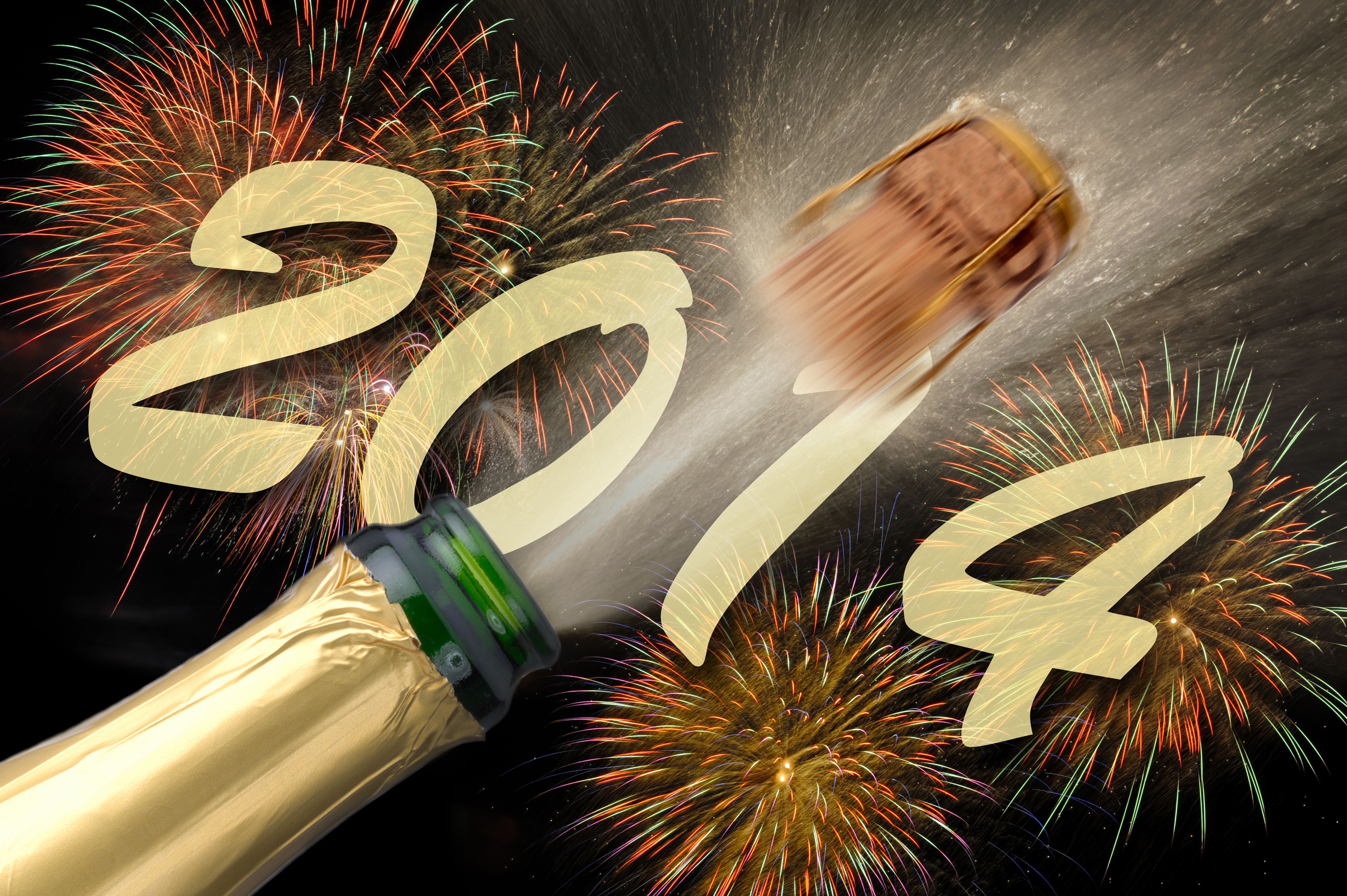 Champagne popping with fireworks and the year 2014 HD Wallpaper