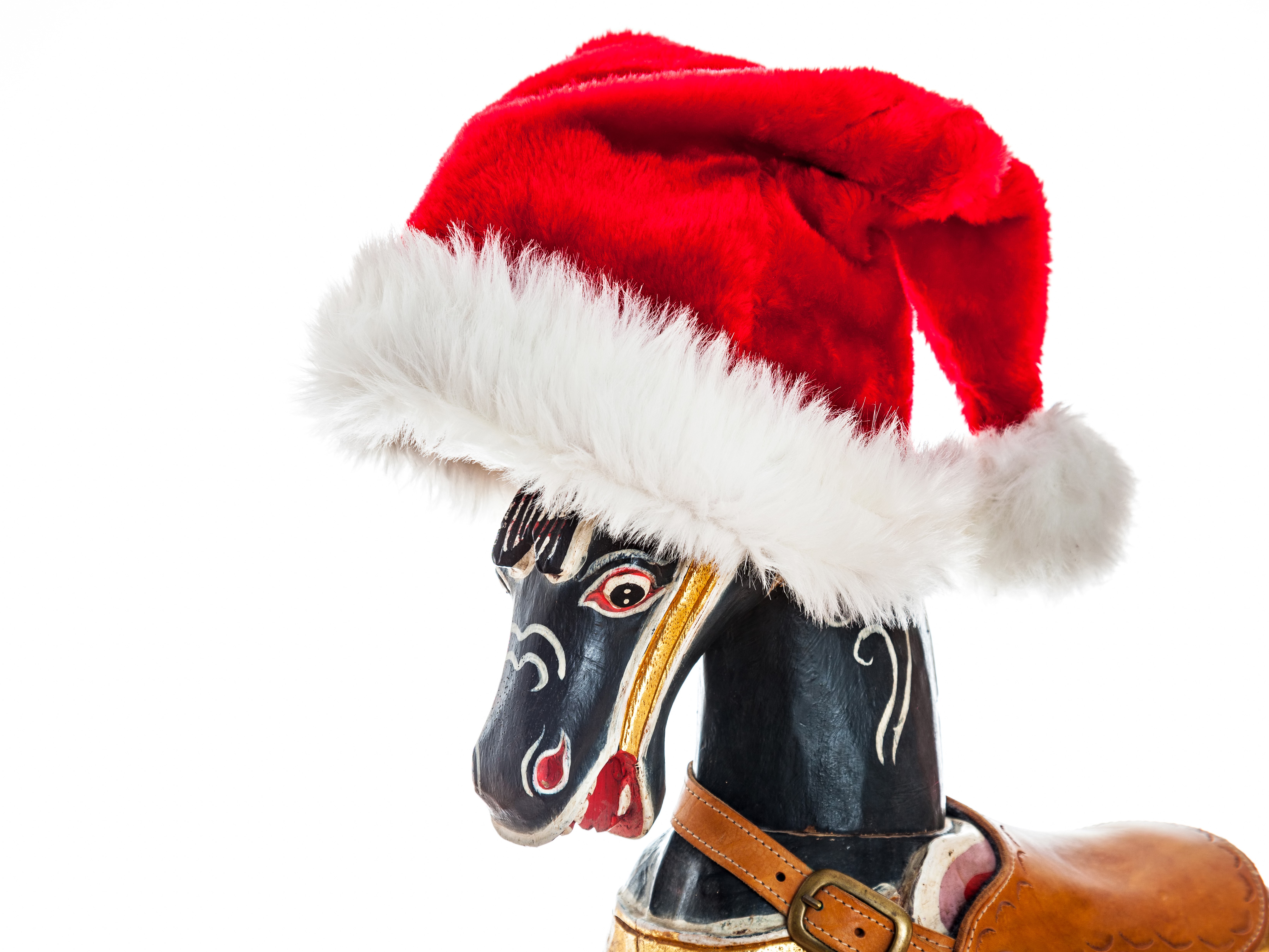 Rocking horse with Santa hat HD Wallpaper