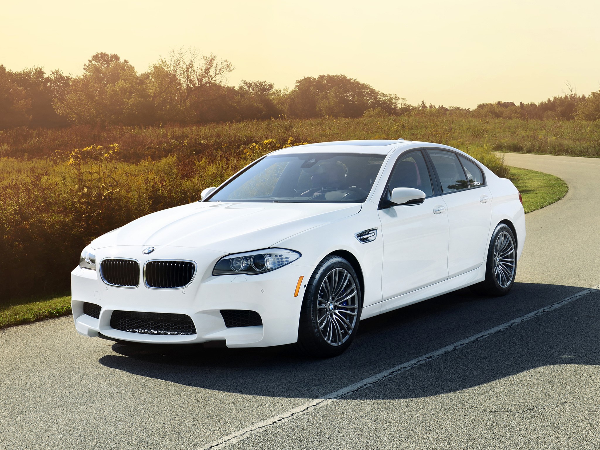 White BMW M5 Sedan on a Road HD Wallpaper