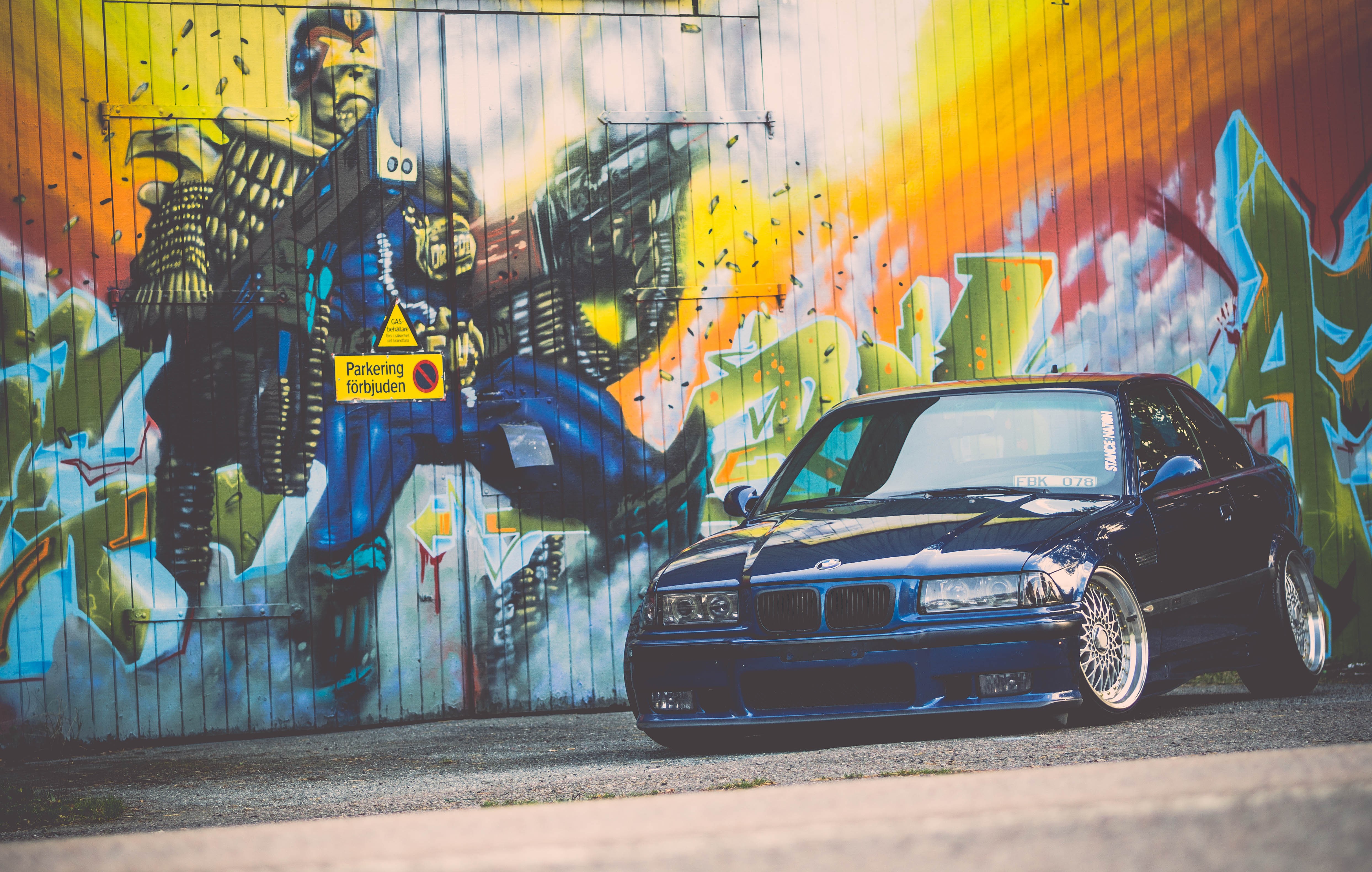4K Blue BMW E36 with Graffiti Background HD Wallpaper