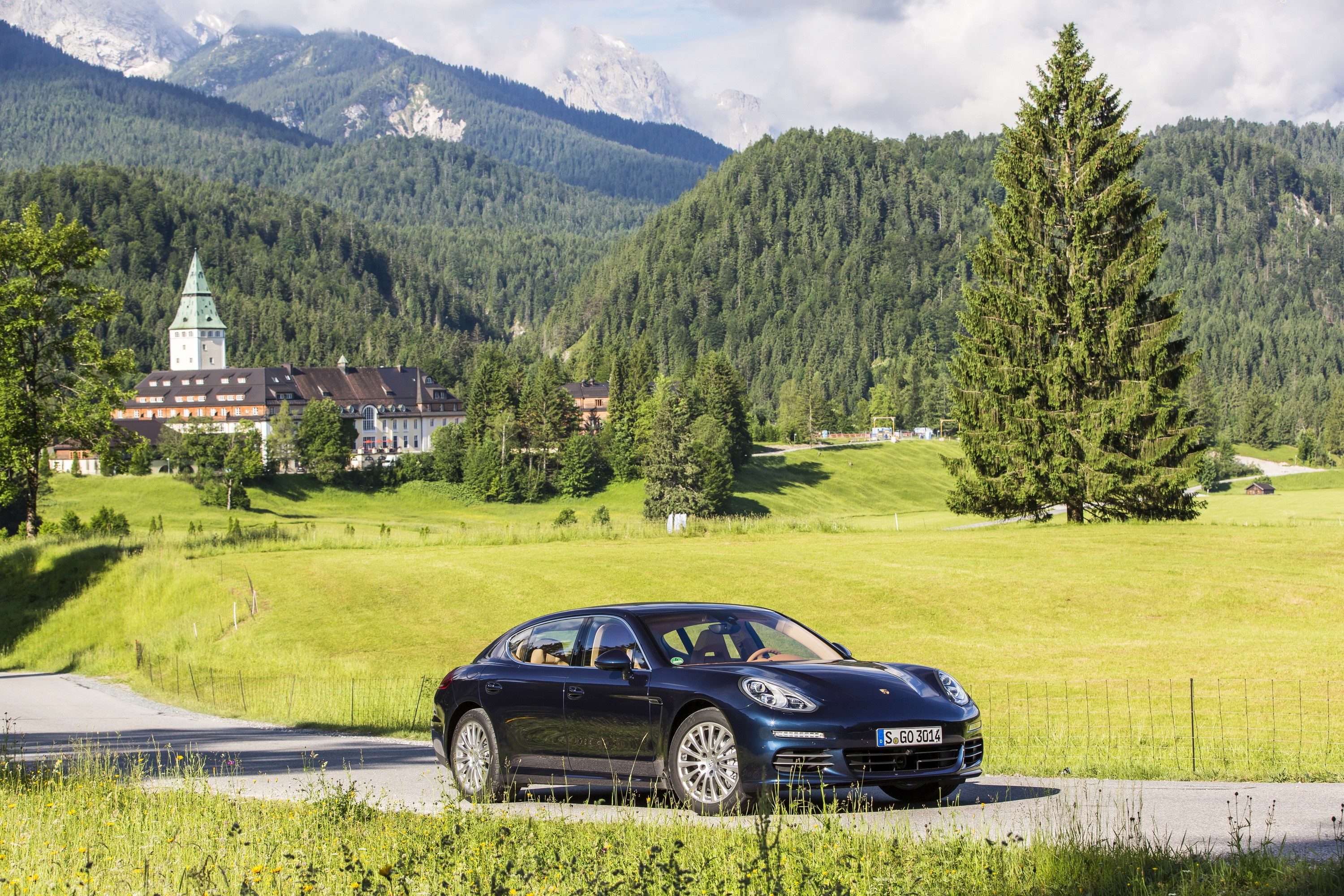 2014 Porsche Panamera 4S in a mountain landscape HD Wallpaper