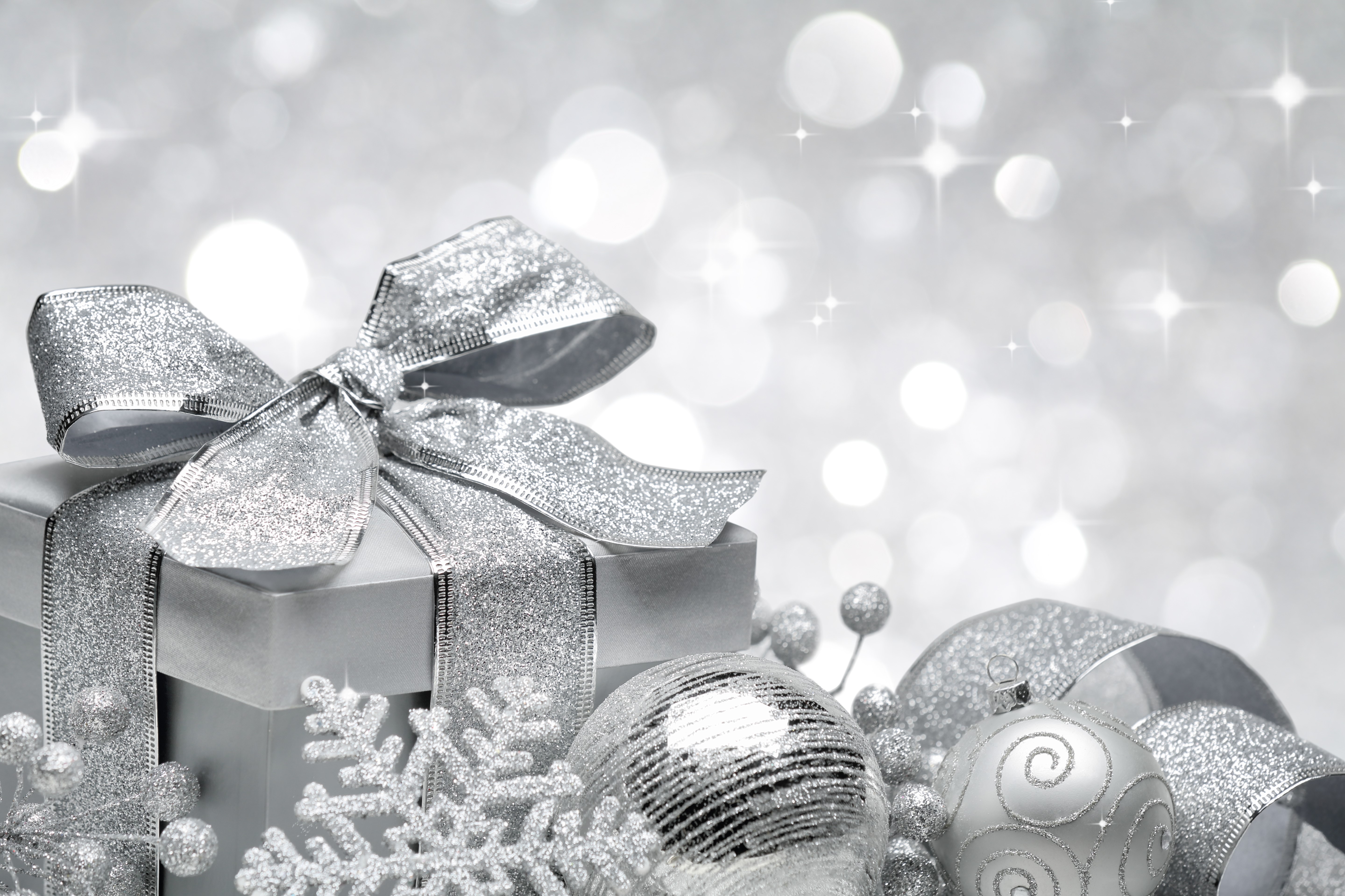 Christmas gift with silver ornaments and bokeh HD Wallpaper