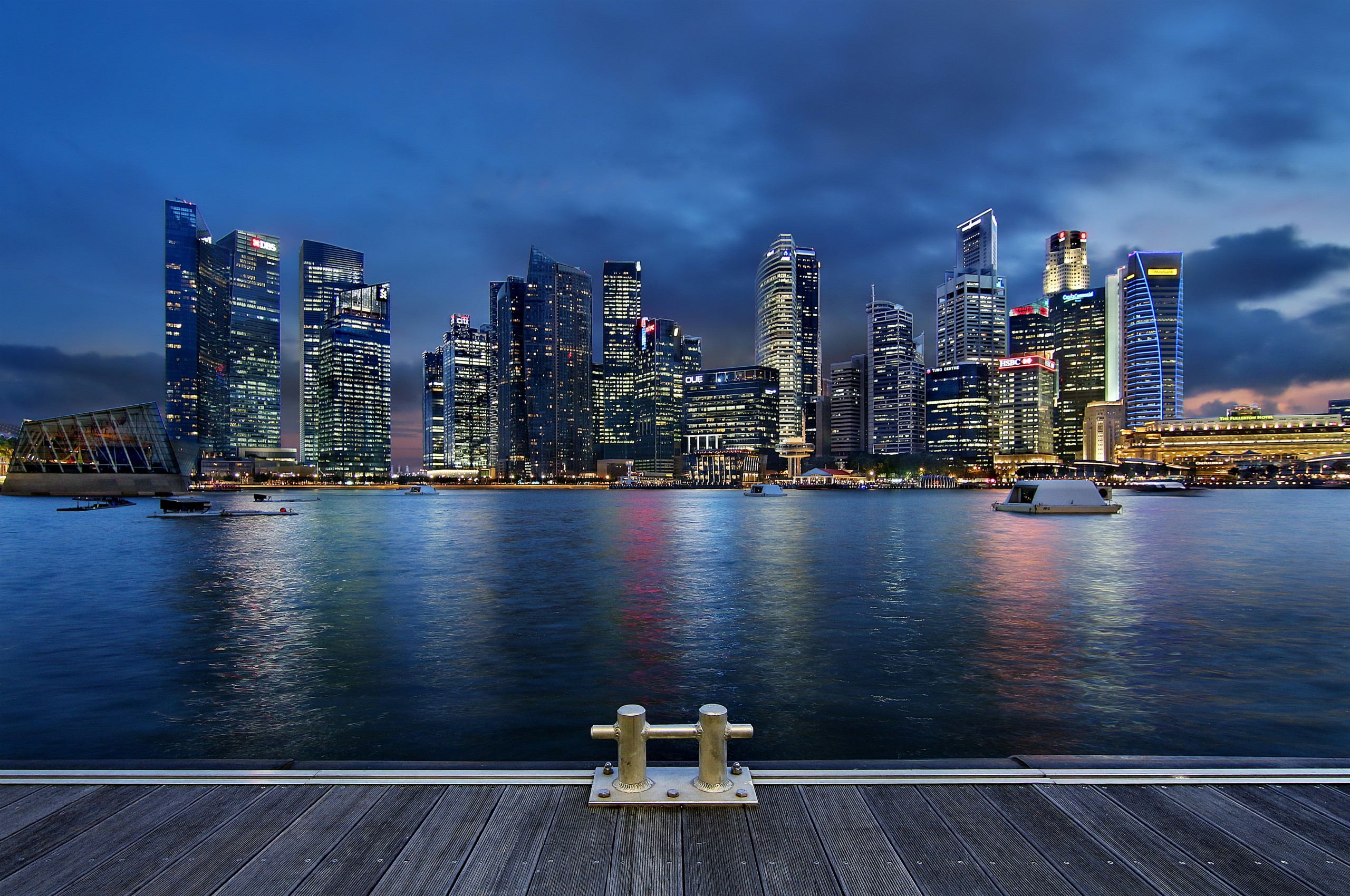 Singapore skyline at dusk with waterfront and skyscrapers HD Wallpaper