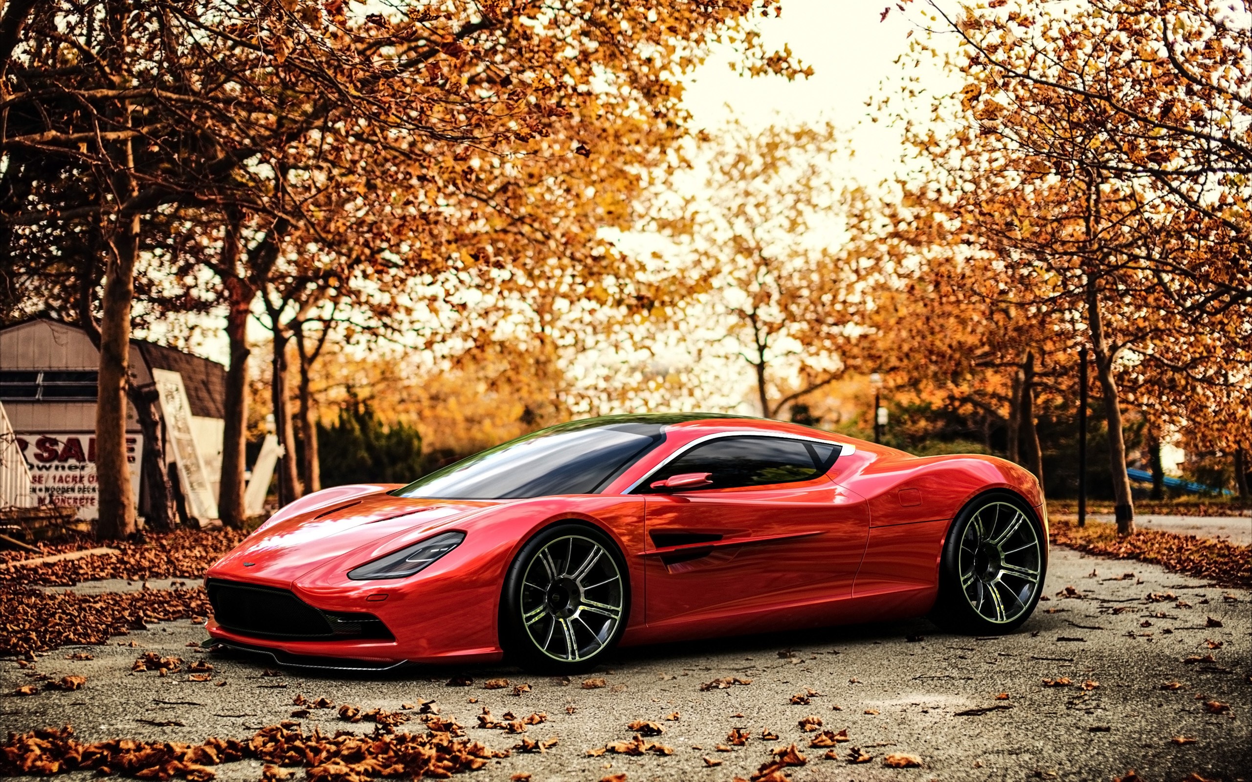 Red Aston Martin in Autumn HD Wallpaper